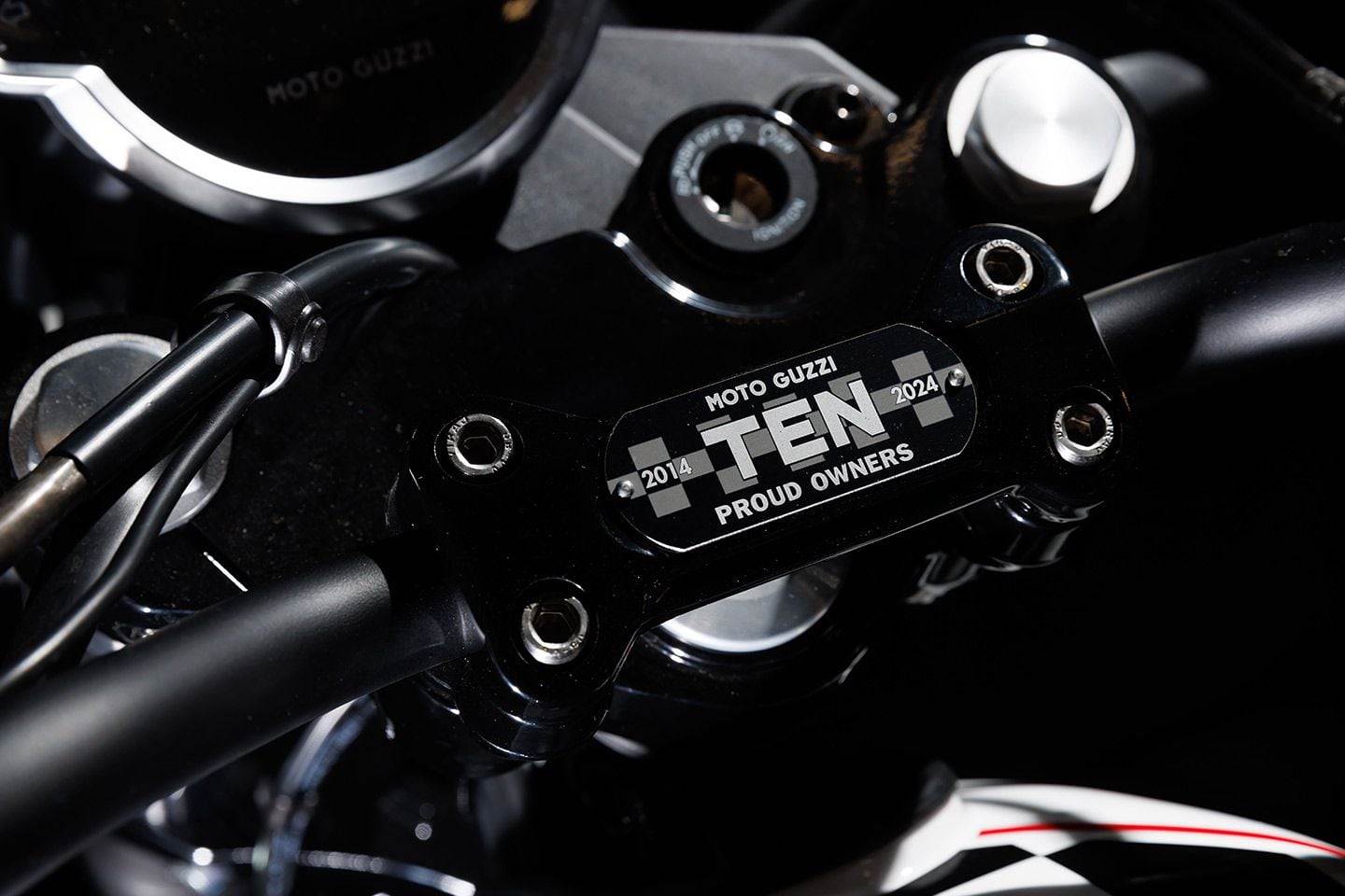 A plate on the handlebar clamp is an unmistakable identifier of the V7 Stone Ten.