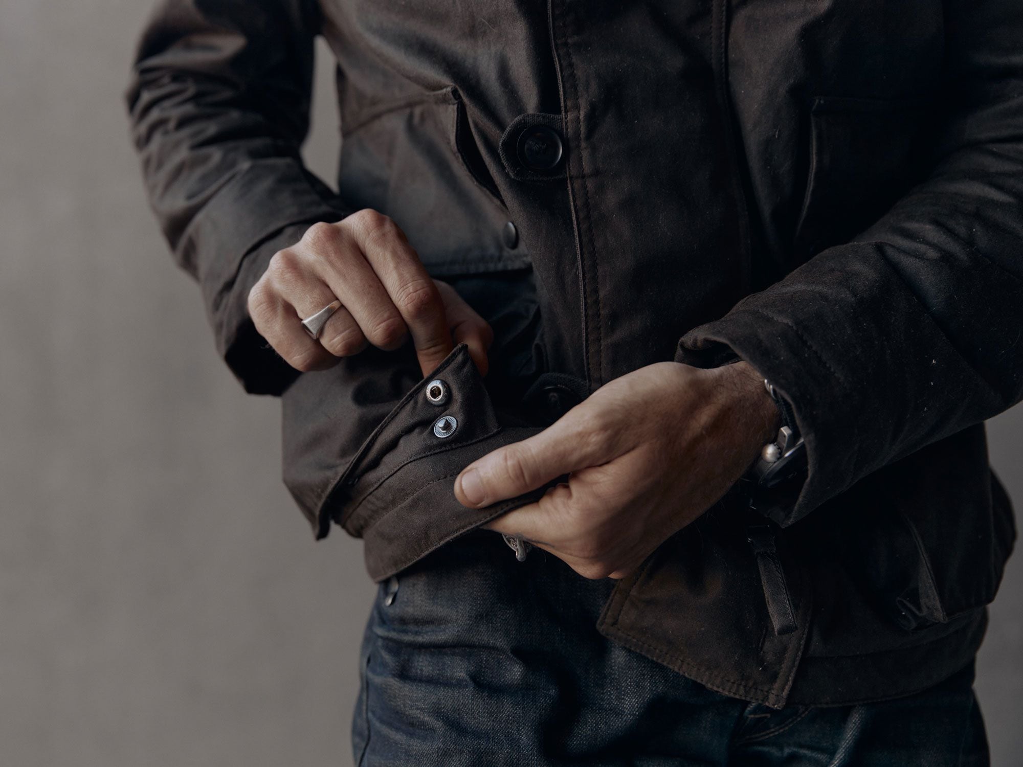 Snaps on the bottom of the main pockets open to increase capacity.