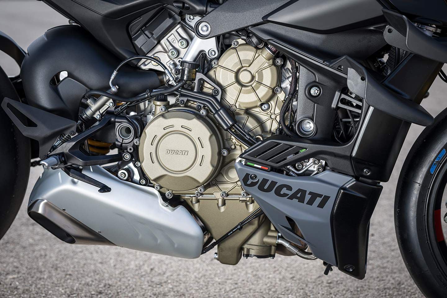 The tailpipe on the 2023 Streetfighter V4 has a slightly larger opening, though the change is for homologation reasons versus any performance gains. Compared to the Desmosedici Stradale in the Panigale V4, this engine uses fixed velocity stacks. Final gearing is shorter too. Recommended valve adjustments are every 15,000 miles.
