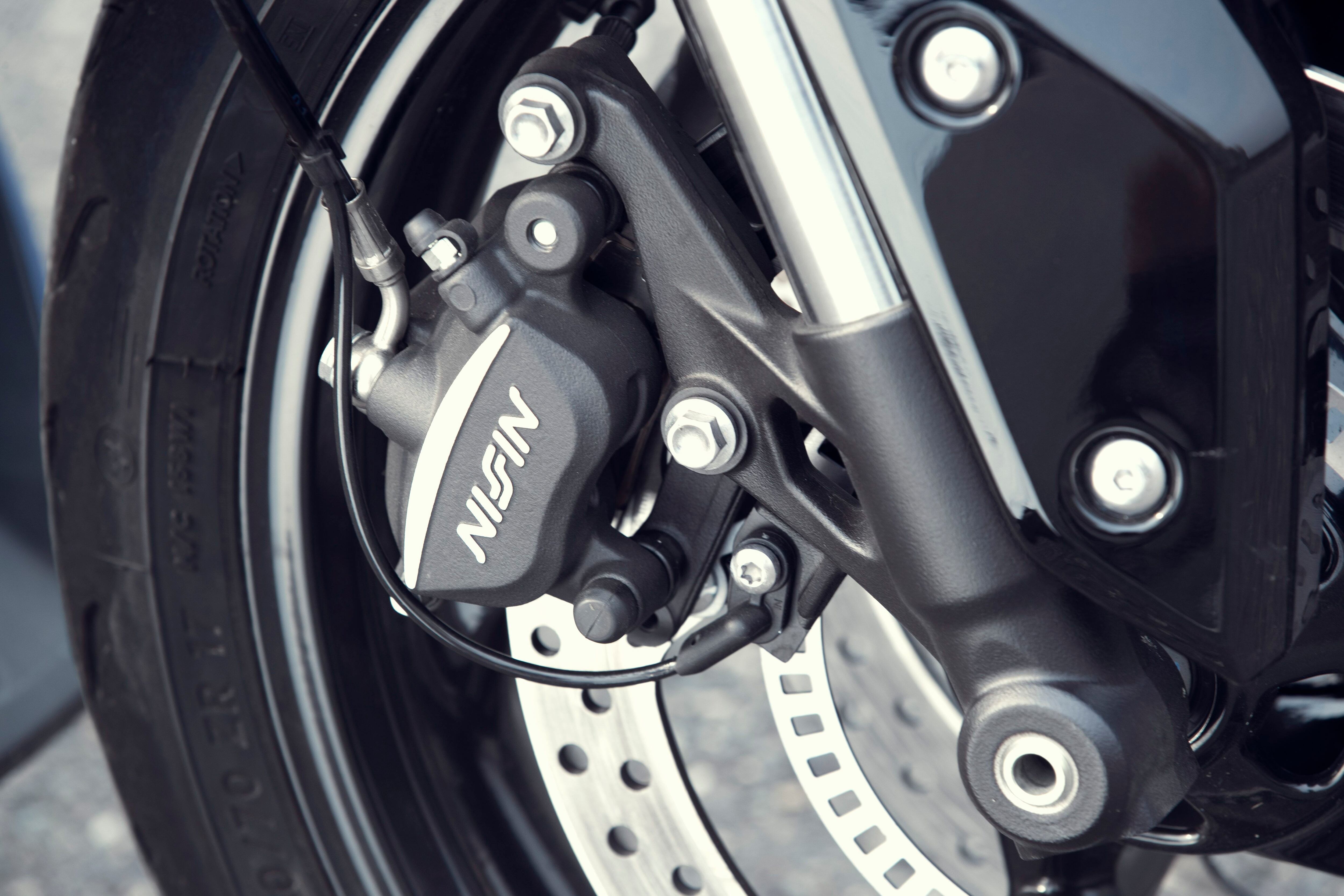 Nissin two-caliper brake setup is par for the segment, but still gives a good bite and plenty of power (though not much feel).