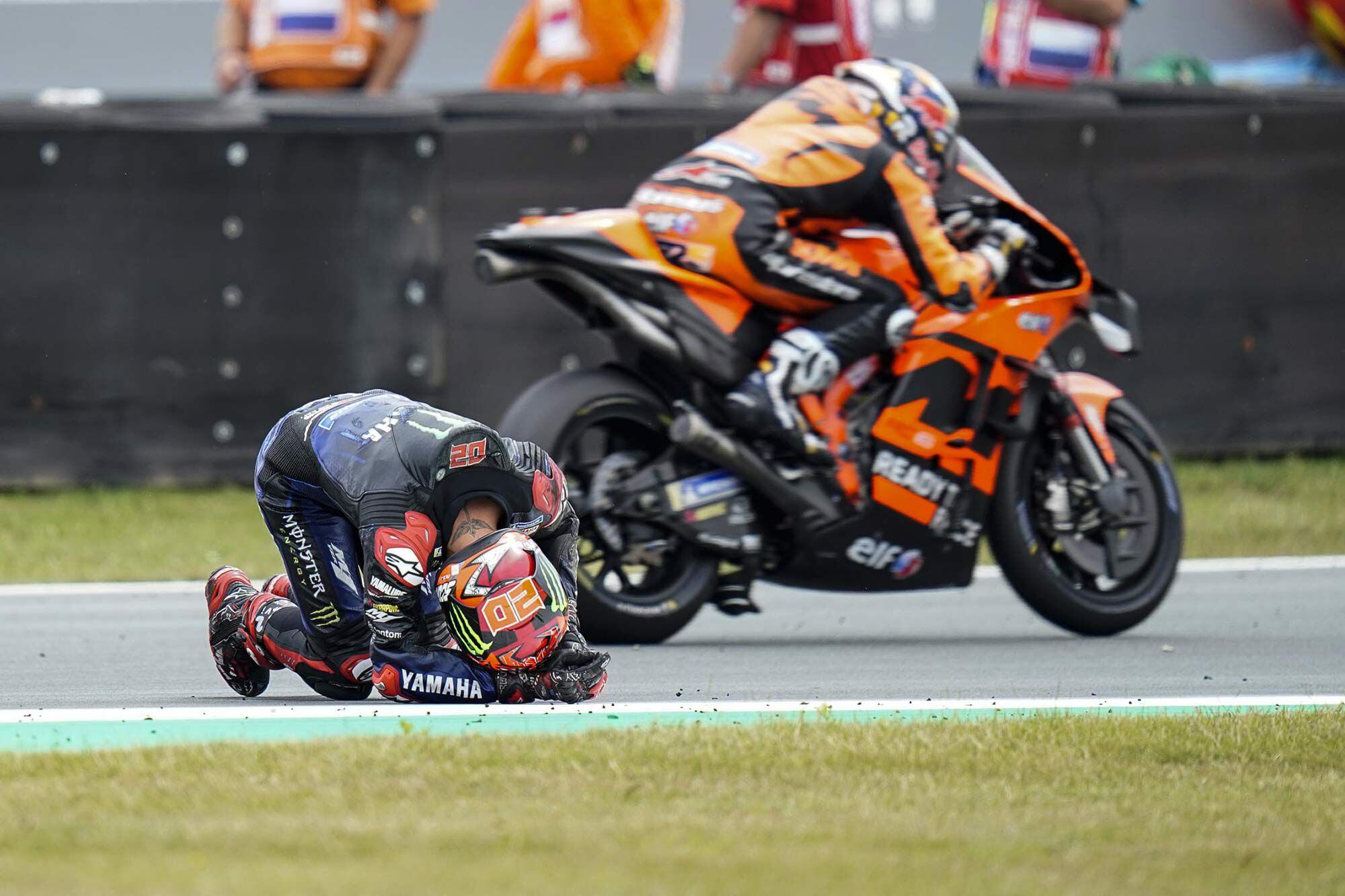 Quartarao crashed twice at Assen. The first nearly took out Espargaró, while the second, a highside, ended his day. He’s still leading in overall points, but his lead was slashed by half, and he faces a “long-lap” penalty at Silverstone.