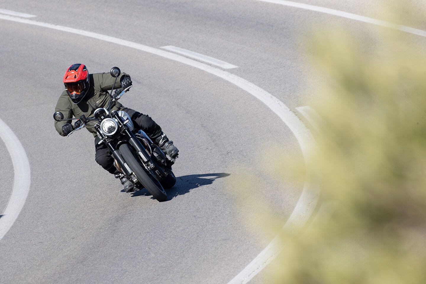 With less ground clearance, footpegs on the Scrambler 1200 X now touch down more often than the previous XC model.