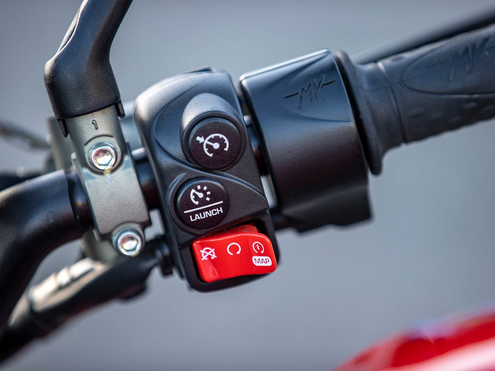 On the right switch gear are buttons for launch control and mode selection.