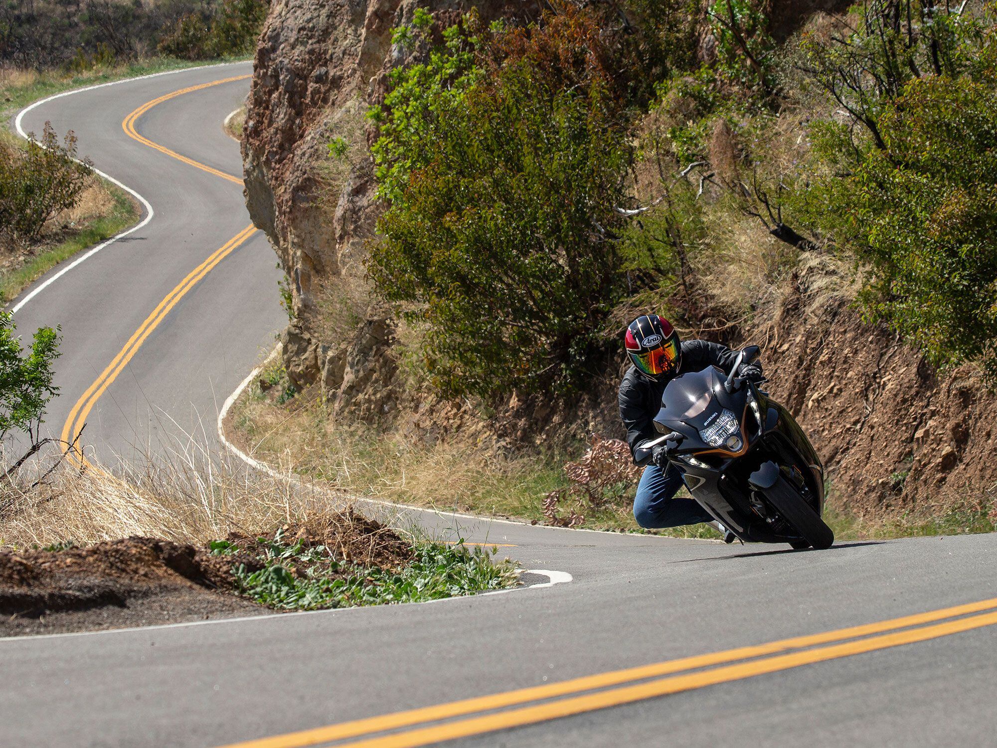 Handling is remarkably good for such a large motorcycle. Steering-head angle is 23 degrees and works with a short 3.5-inch trail and longish 58.3-inch wheelbase for a fine combination of agility and stability. On tight roads, you’ll never forget you’re riding a claimed 582-pound-wet machine. On straightaways, you’ll think the bike is weightless.