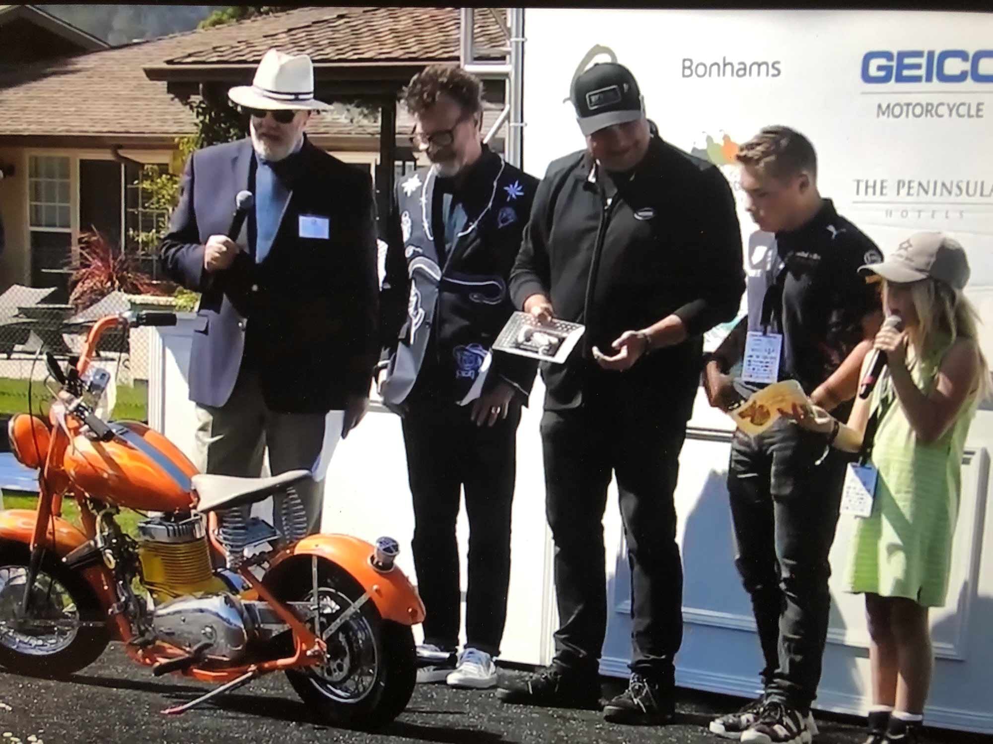 On the stage of the Quail Motorcycle Gathering.
