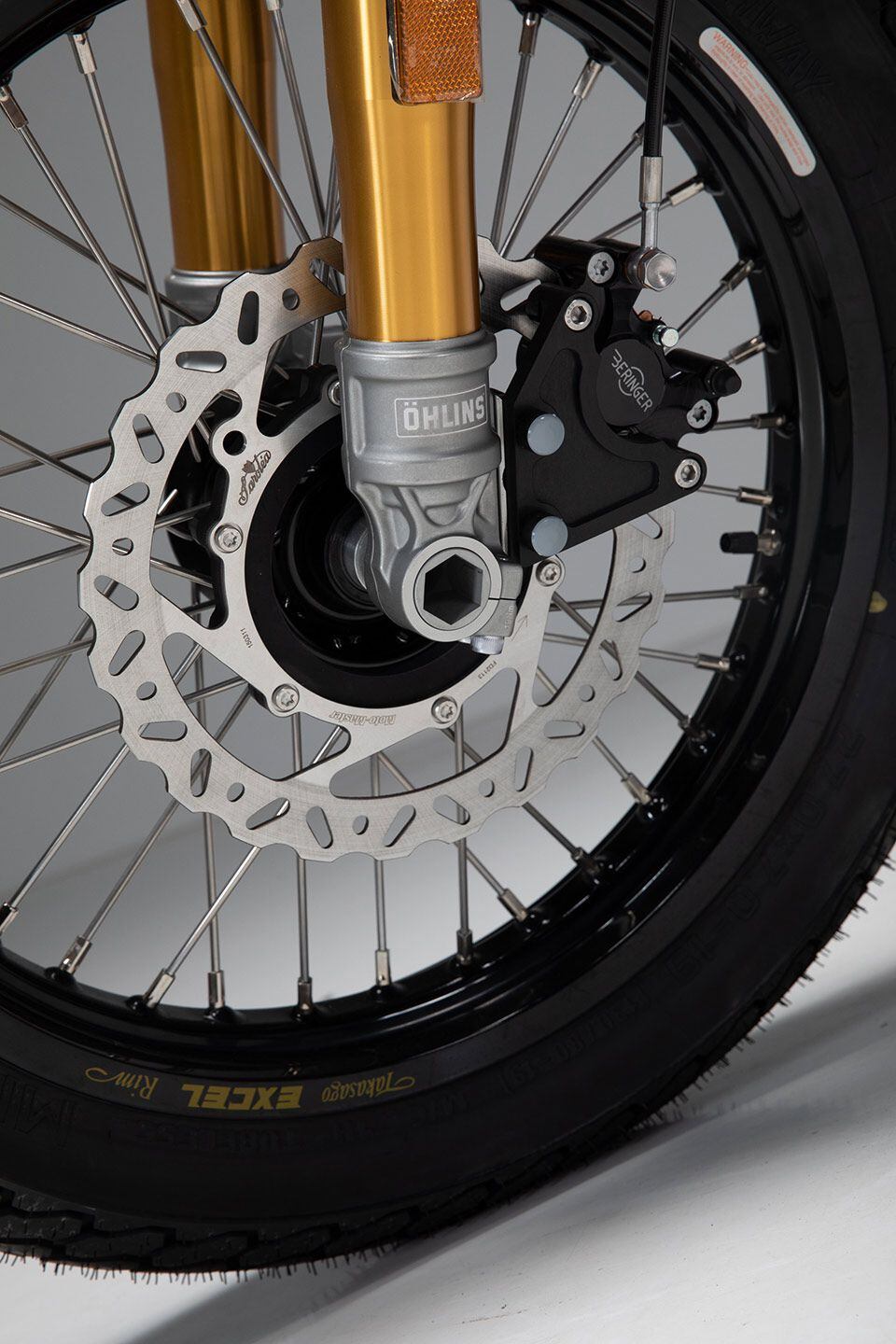 Öhlins supplies the front suspension, with Saroléa Performance Tech providing calibration. Beringer brake calipers appear front and rear.