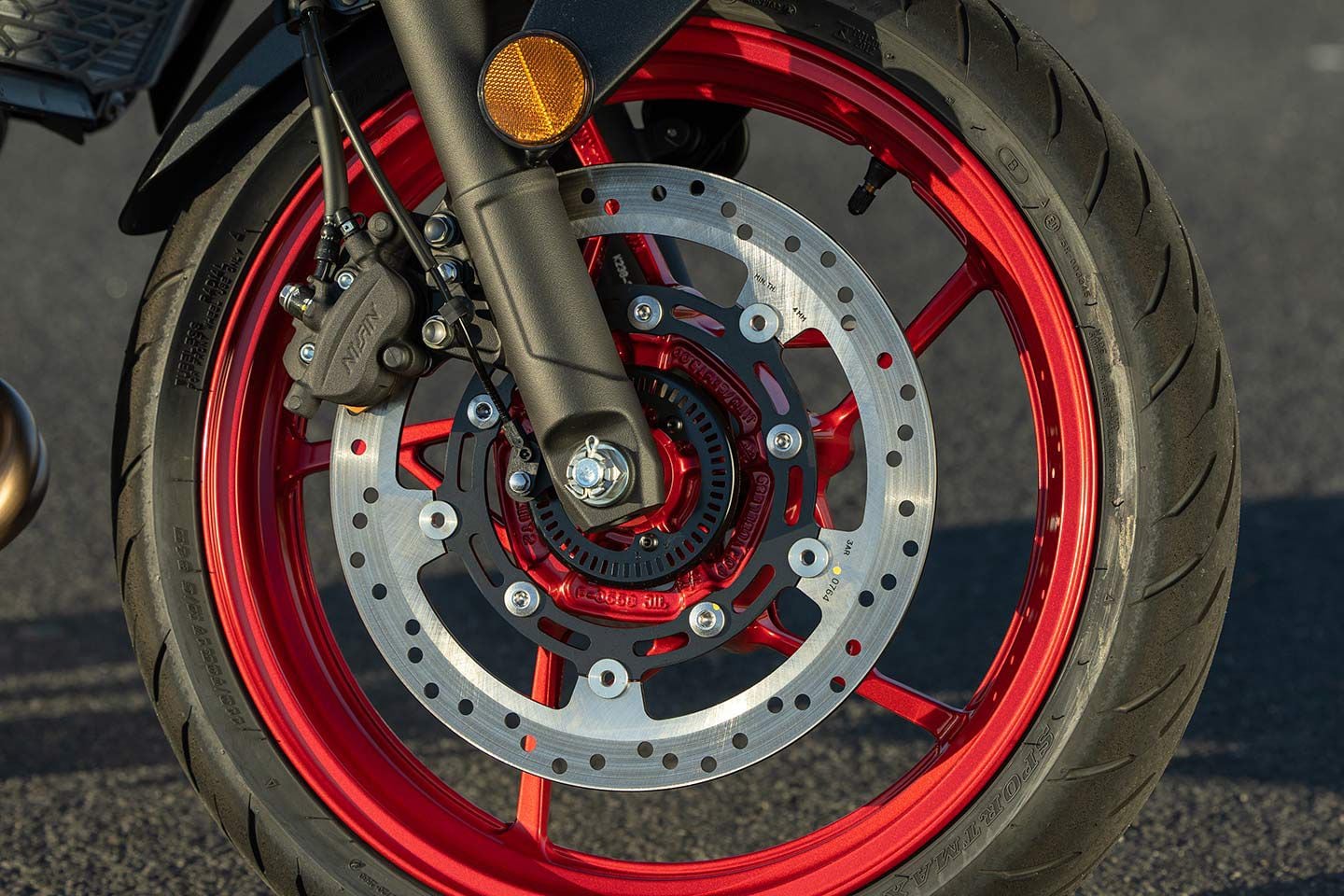 Kawasaki's Z500 is equipped with a 310mm disc and a dual-piston Nissin caliper.