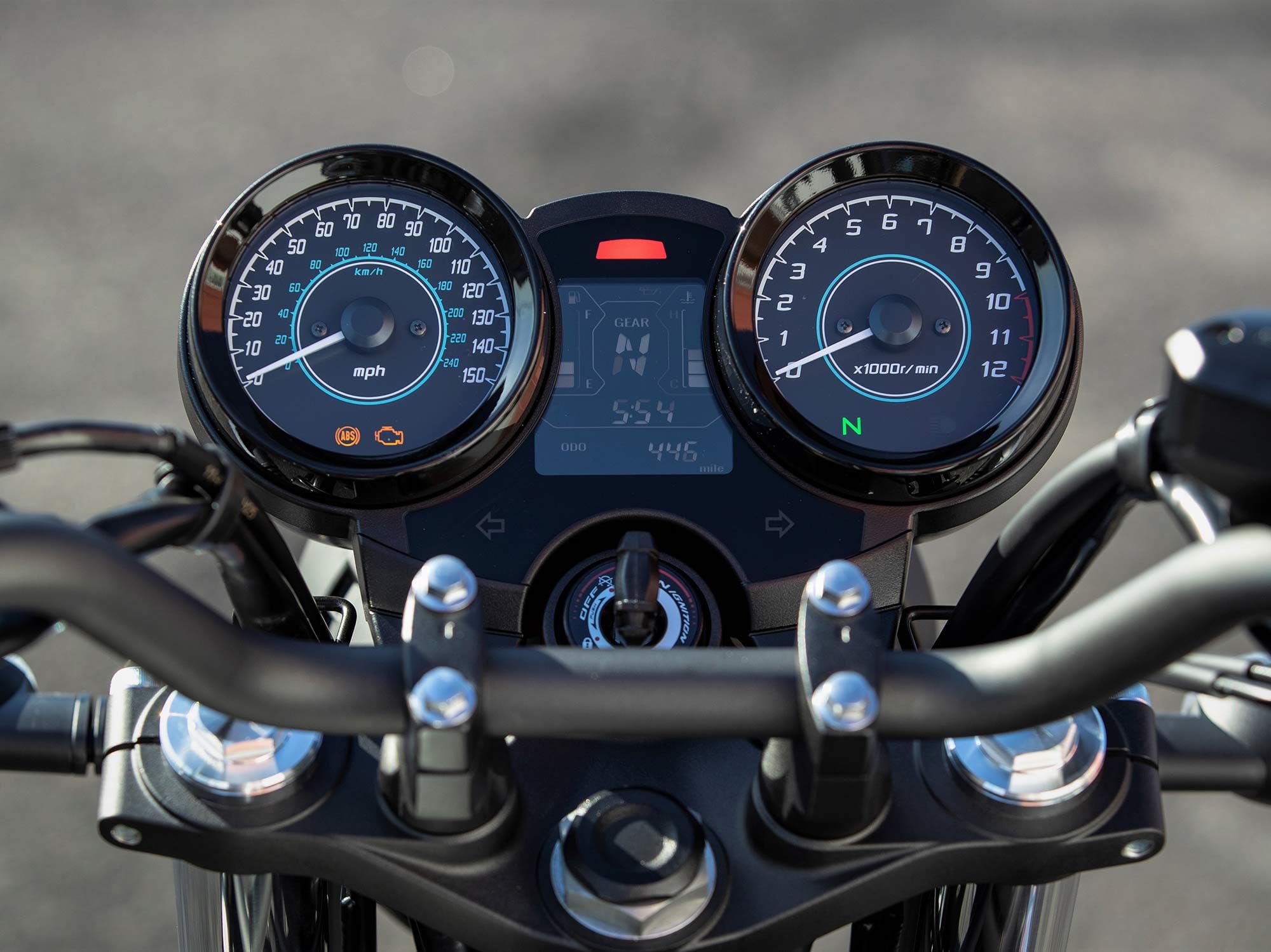Kawasaki says they’re “all-new” but the old-school dual analog dials can be better described as “no frills.” Also, an LCD readout is nestled between them.