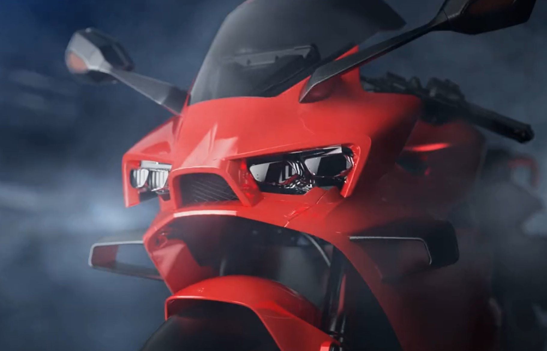 The front fairing incorporates winglets, while a ram-air intake sits right under the headlight.