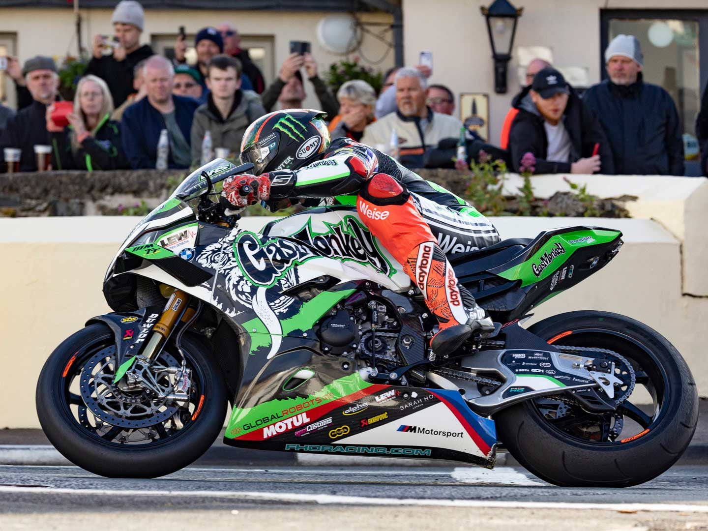Lap record holder Peter Hickman, on his finely tuned BMW M 1000 RR, blasts past Ramsey’s Parliament Square.