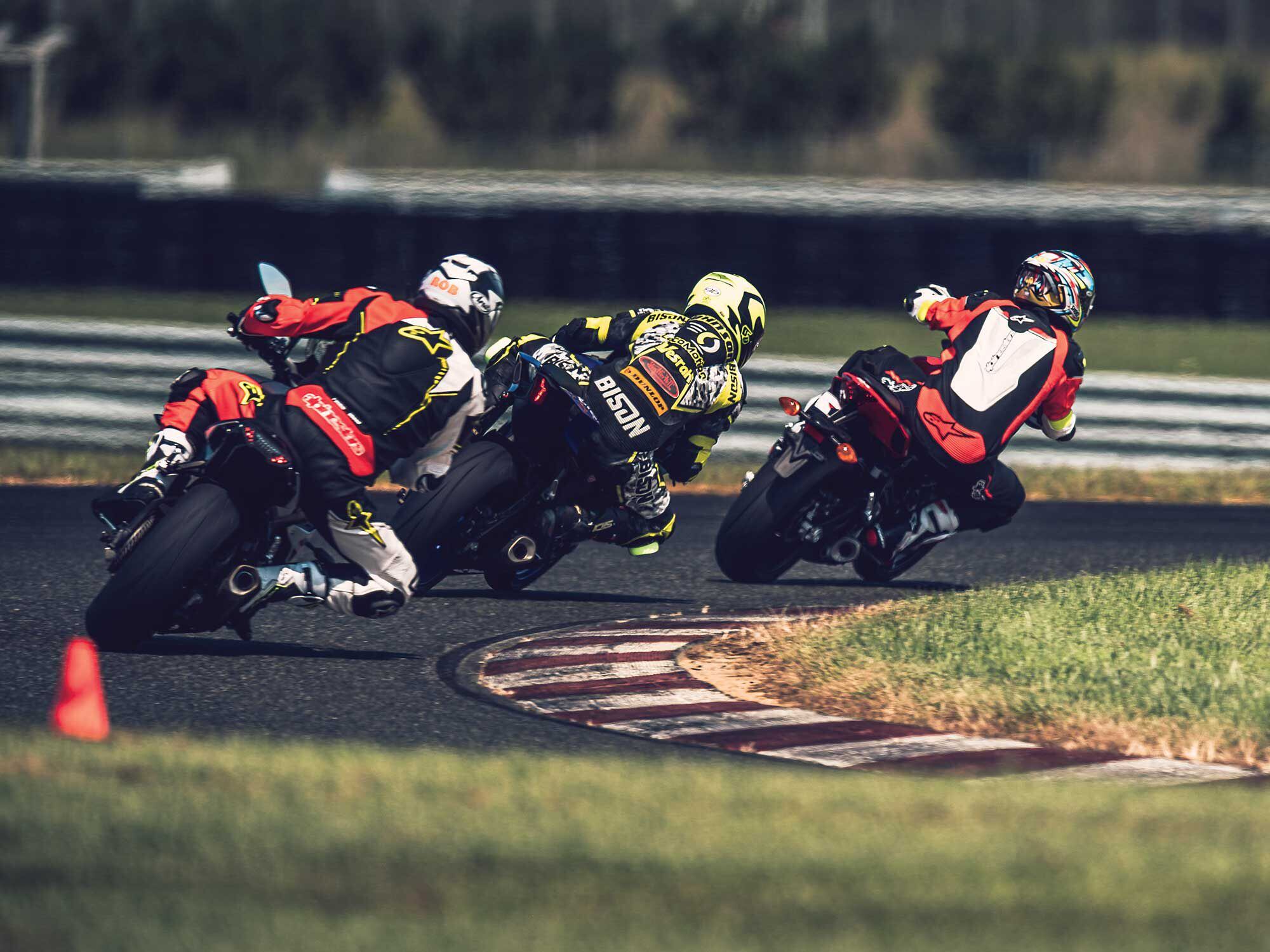The author, on the Yamaha in front, attempts to learn and get himself more off the bike.