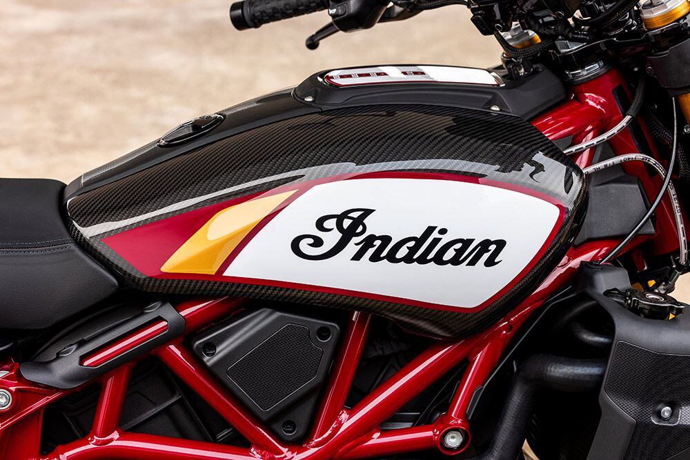 A splash of gold on the tank complements the red accents on the predominantly black and carbon Championship Edition.