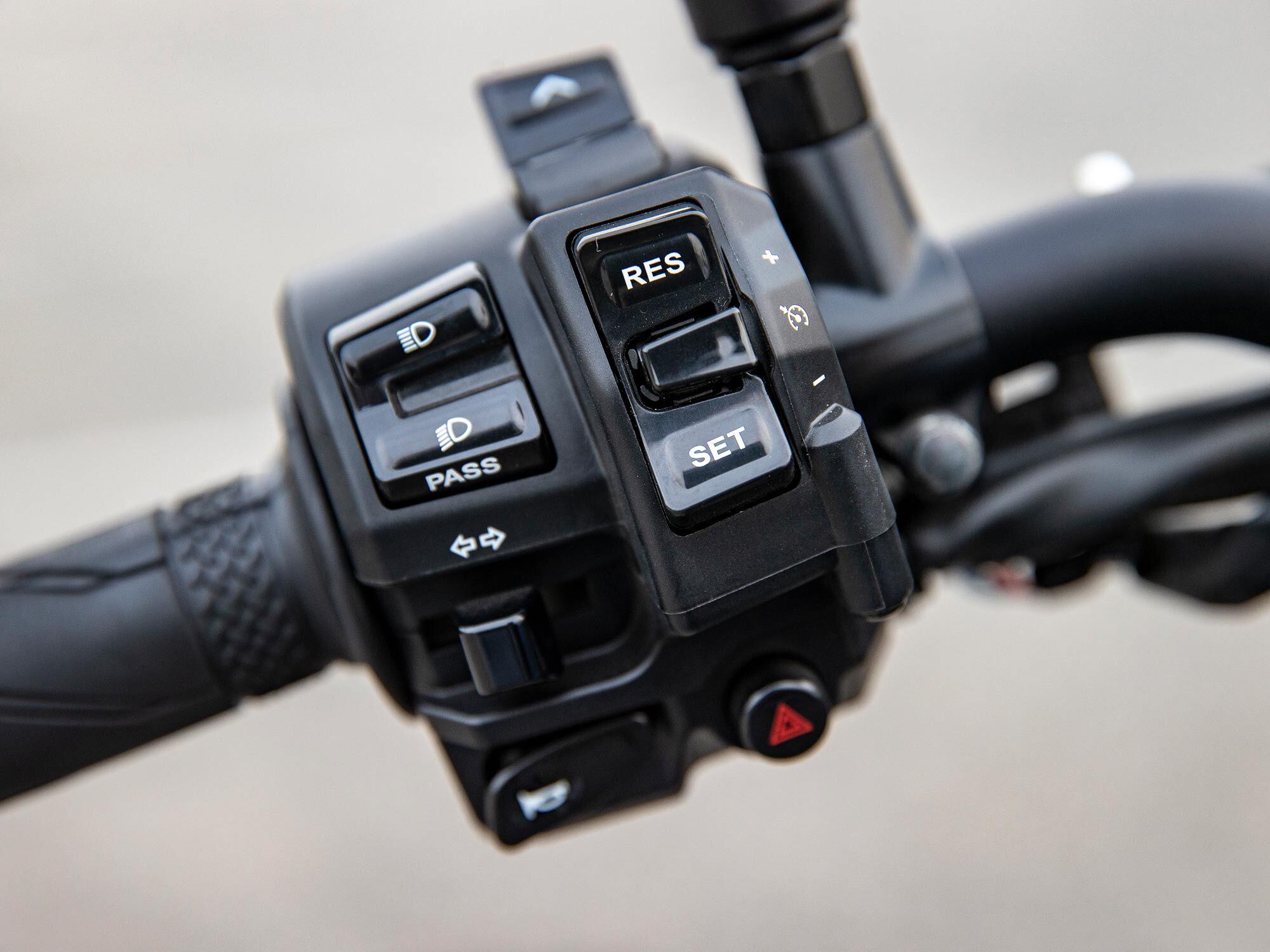 Cruise control switch gear resides on the left side of the one-piece handlebar.