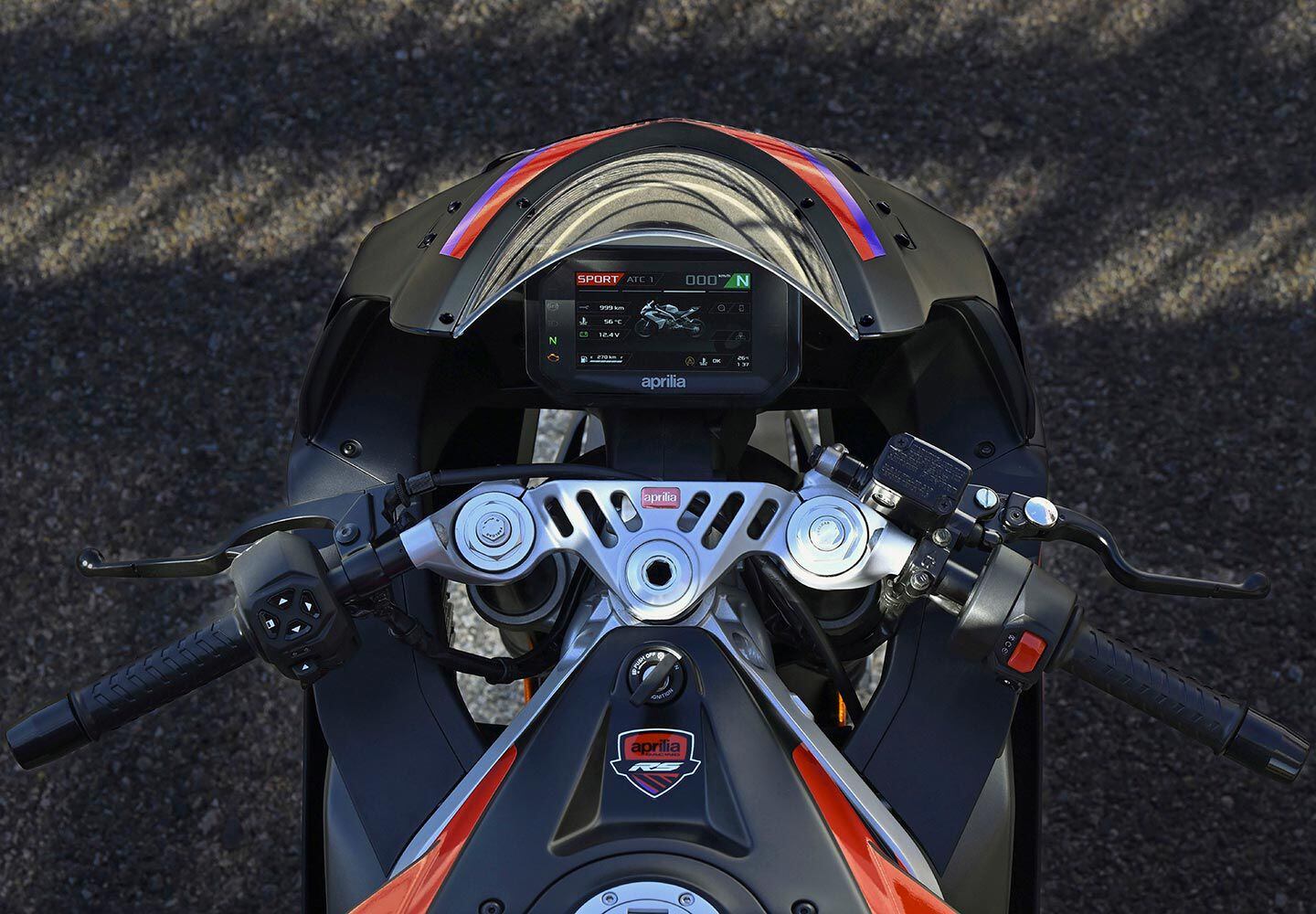 A 5-inch TFT display and backlit handlebar switch gear give big-bike vibes.