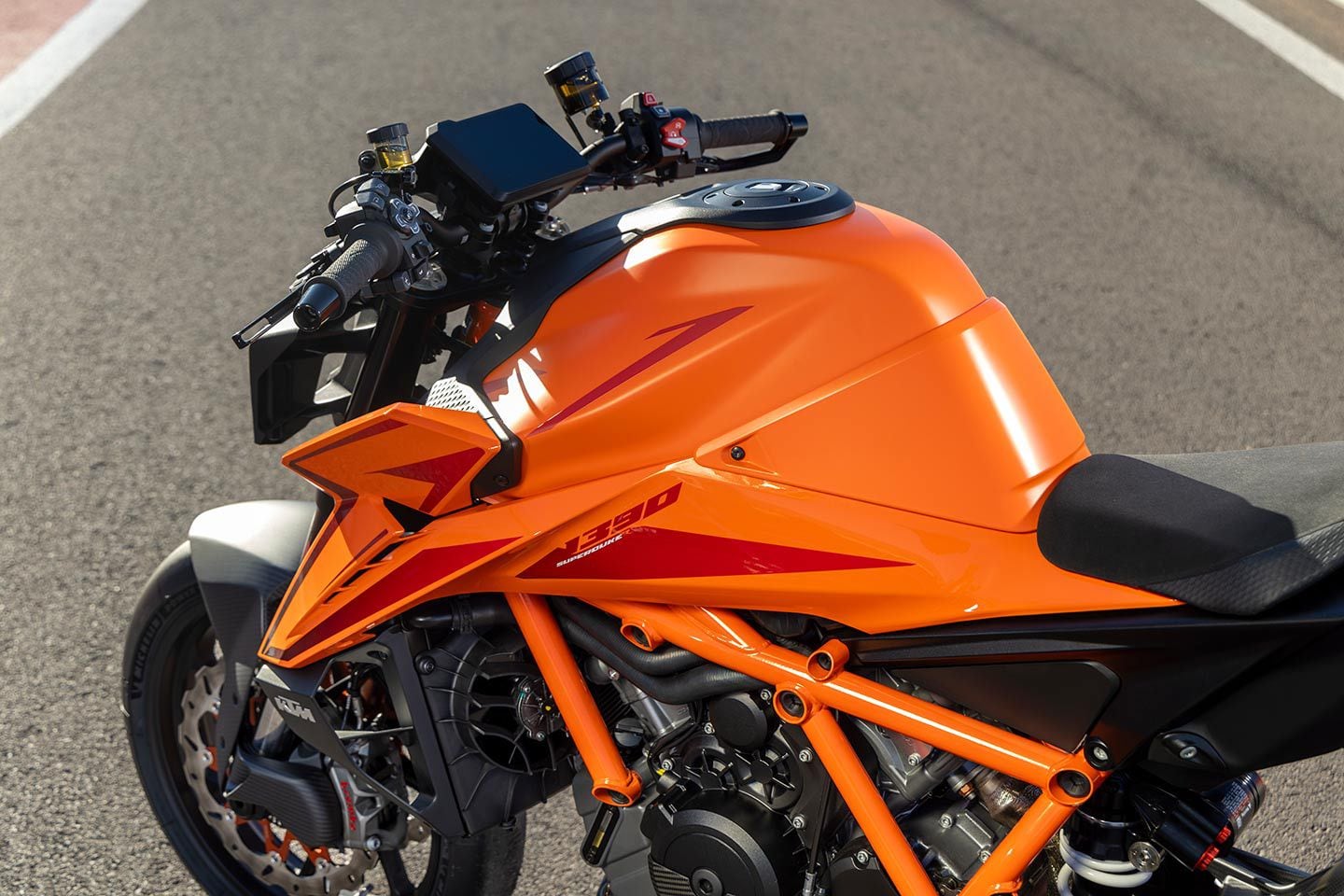 The 2024 Super Duke has a 0.4-gallon-larger fuel tank and a few new styling touches, like winglets (just below the tank spoiler). Yes, this is a bike made for wheelies, but with winglets that are intended to keep the front down. You could say the same thing about traction control too.