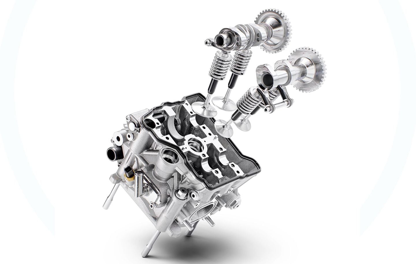 KTM’s camshaft technology works on the intake side. The electronically actuated system switches from a mild cam lobe to a more aggressive lobe just below 6,000 rpm.
