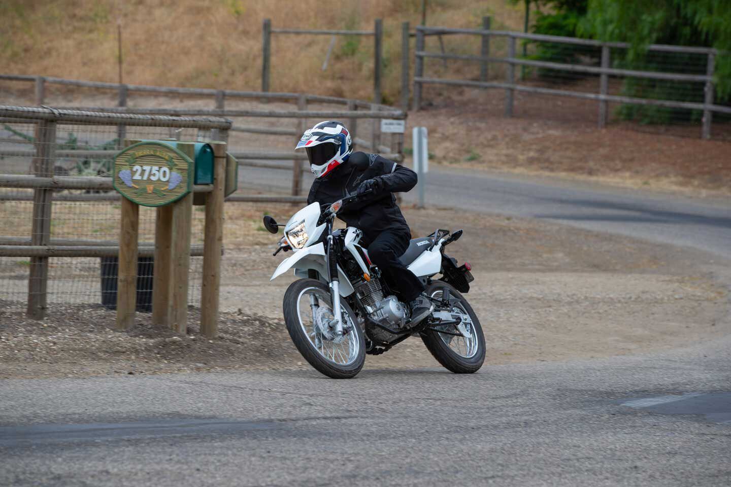 Fitted with a dual sport tire, the Honda XR150L is not intimidated by a dirty backroad.