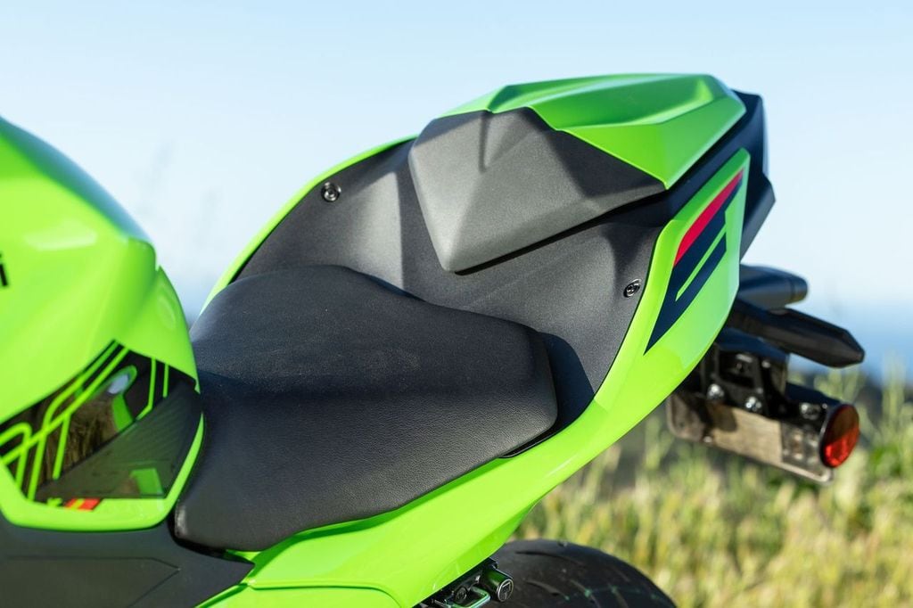 Kawasaki has redesigned the Ninja 500 seat shape and seat cover. It is a more comfortable ride and the faux leather covering allows for better sliding action compared to grippier materials of the past.