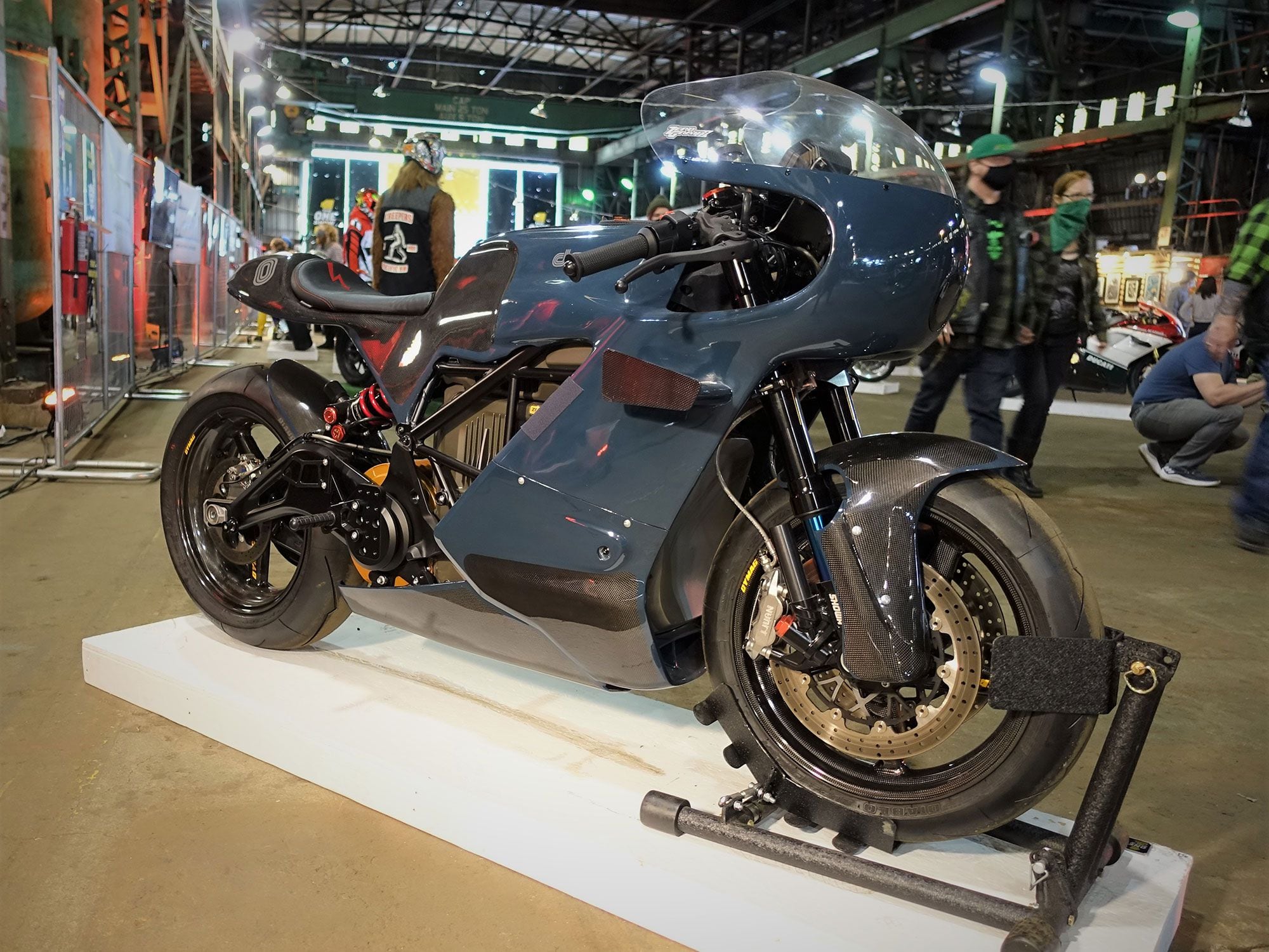 Michael Woolaway designed this custom Zero motorcycle with carbon fiber bodywork that can install on a stock motorcycle quickly without any modification to the bike’s chassis.