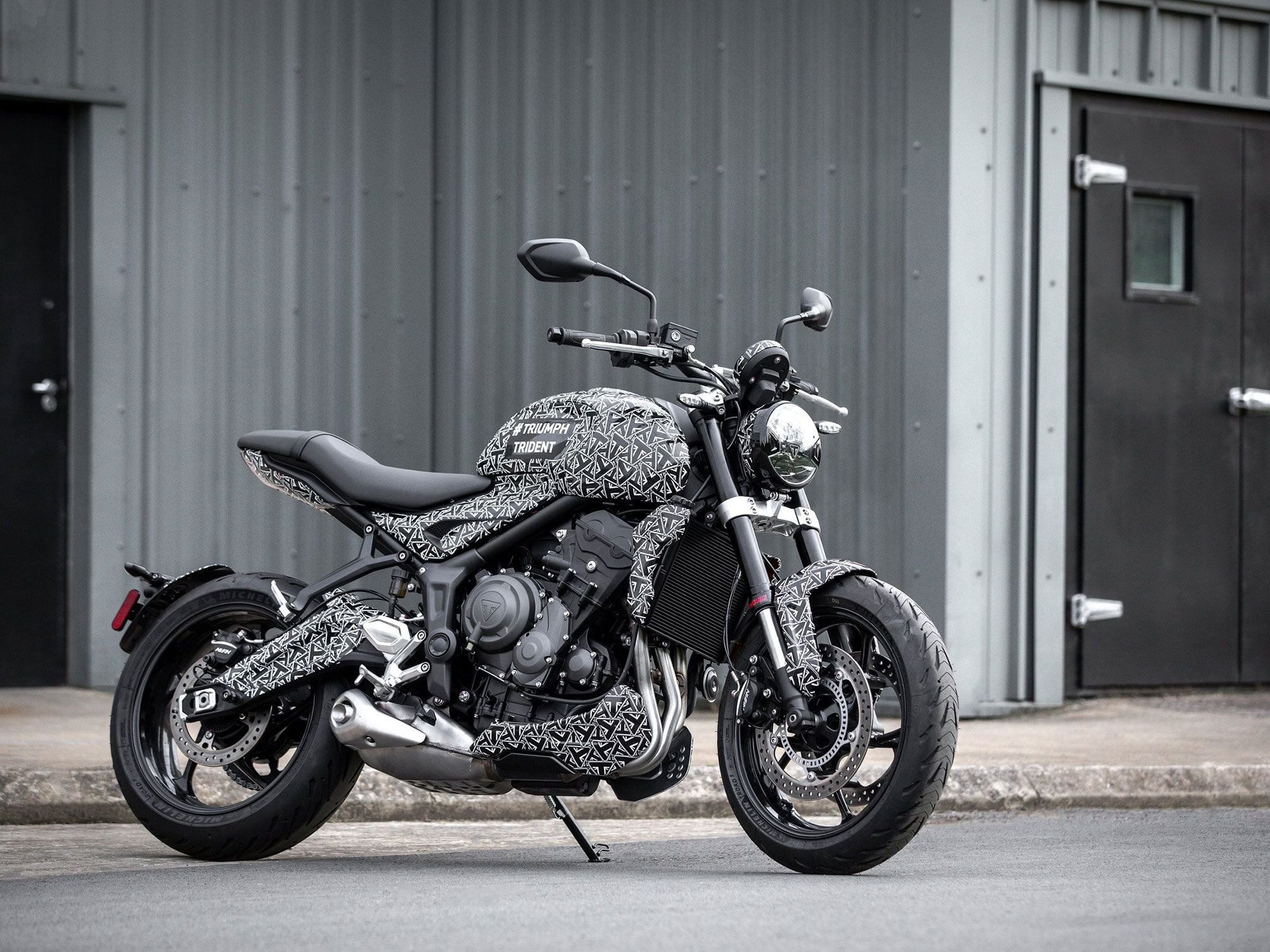 Triumph is still mum on the specs, but it looks like the Trident has a new, simpler chassis with many components borrowed from the Street Triple S.