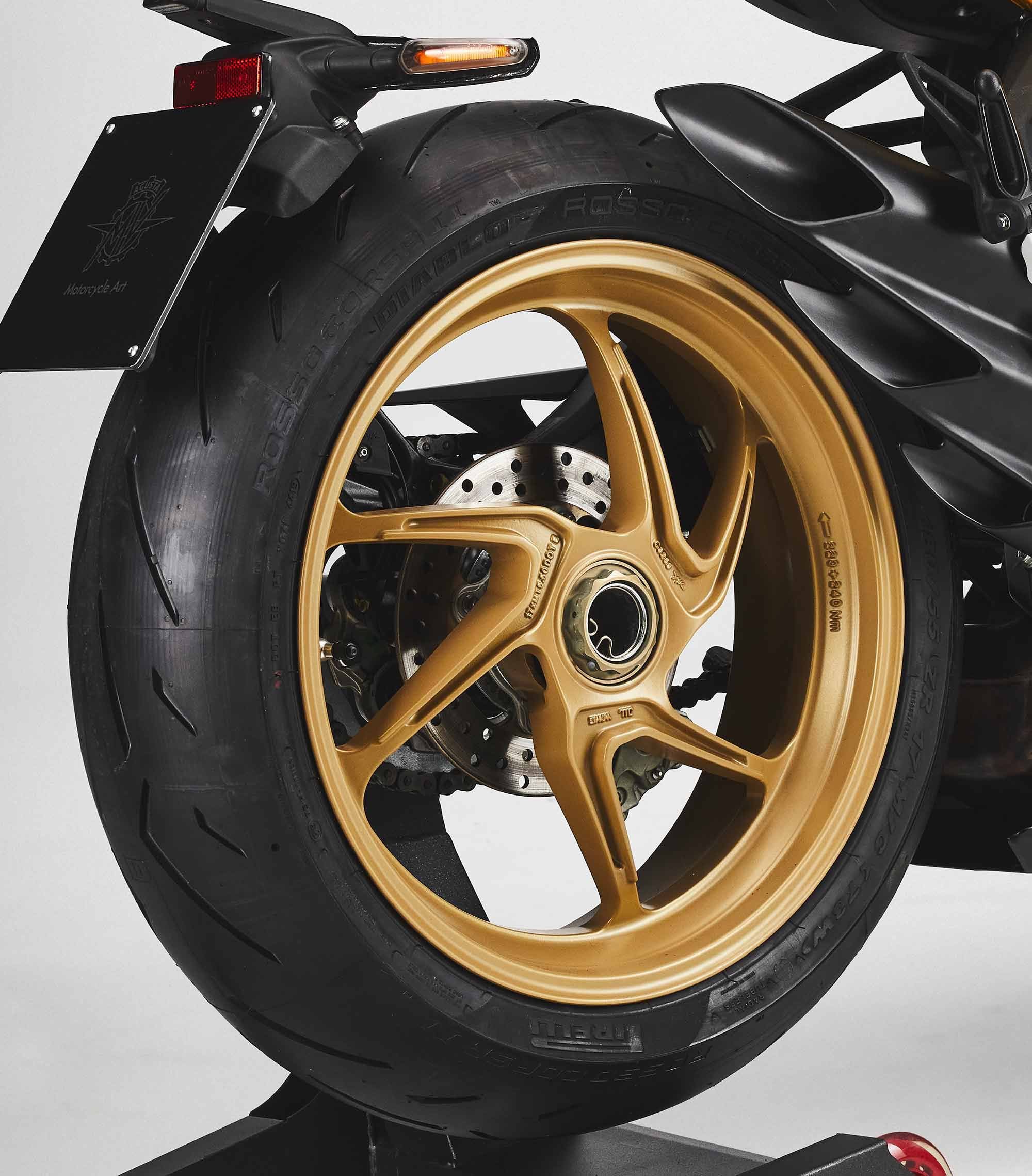 New Pirelli Diablo Rosso IV tires front and rear mount to gold wheels. And the Superveloce’s single-sided swingarm shows that wheel off in a visually impressive manner on the right side.
