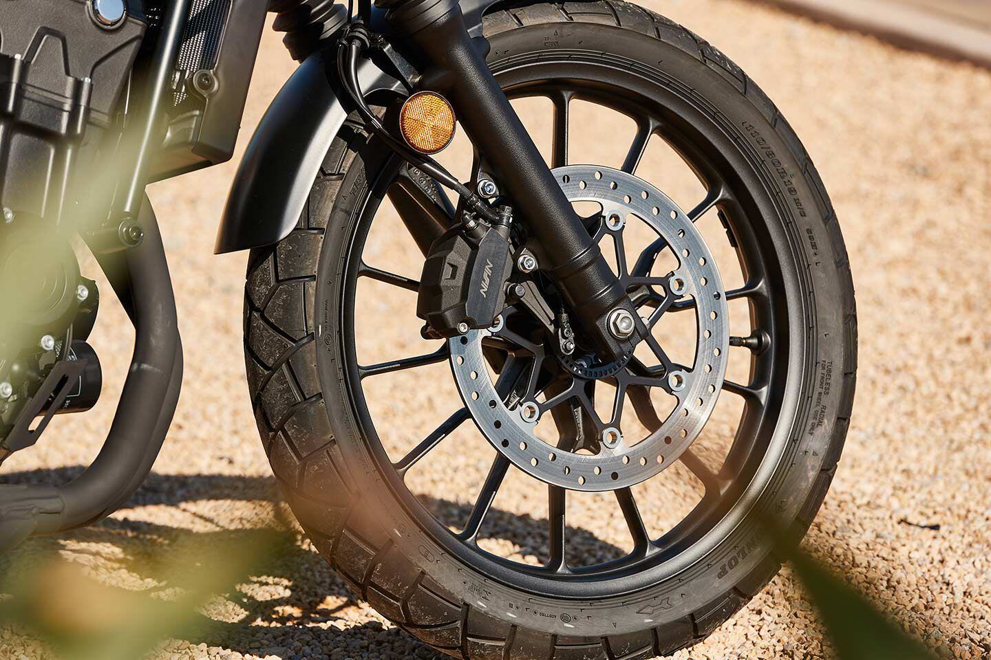 The SCL500 gets a larger brake disc than its 500 stablemates, while also rolling on Dunlop Trailmax Mixtour tires. Single disc saves weight and cost, and is all that’s really needed here.