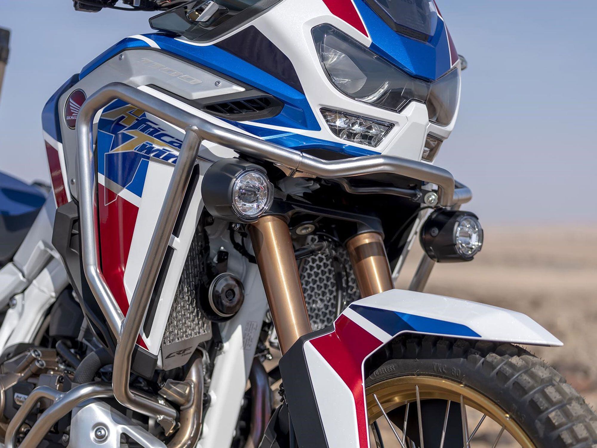The Africa Twin already has the perfect spot for tucking in a sensor unobtrusively, just under the headlights.
