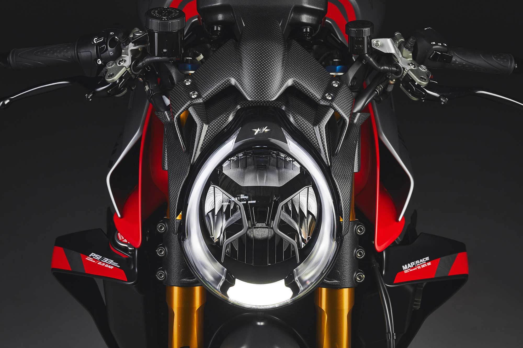 The subtle carbon fiber spoiler/cowl above and around the headlight is the only bodywork change to the new MV Agusta Brutale 1000 RR Nurburgring. While designed to increase downforce, it also sets the bike apart as a limited edition.