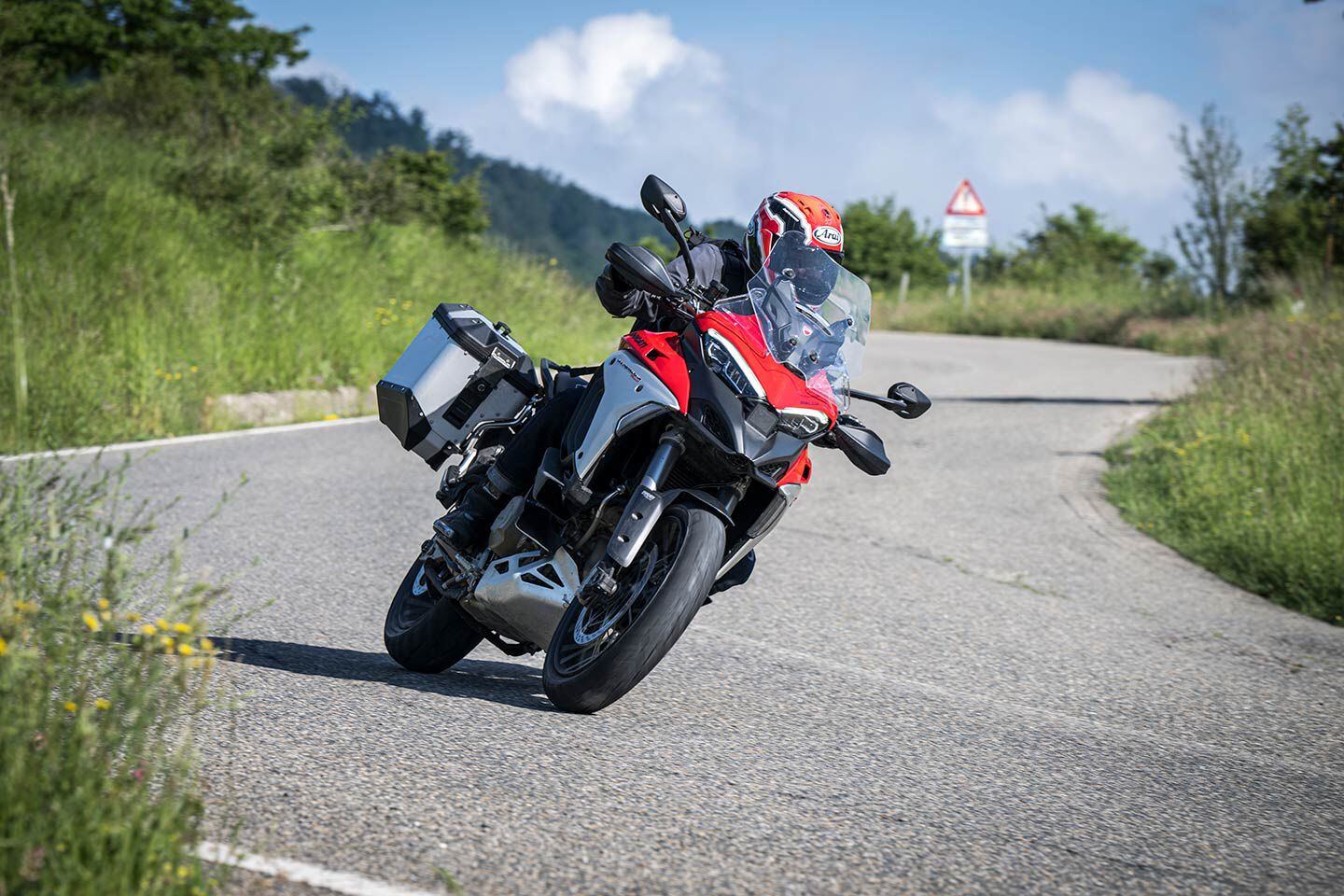 June in Tuscany. The Multistrada V4 Rally uses extended cylinder deactivation to improve efficiency and thermal comfort. Adaptive cruise control, blind spot detection, and Minimum Preload and Easy Lift—which lower the bike to enable an easier reach to the ground—add previously unheard of convenience and comfort.