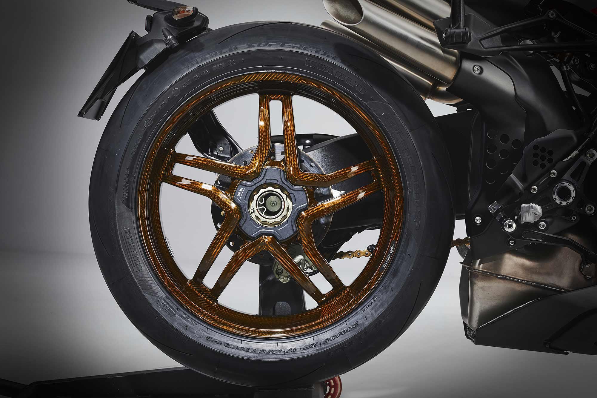 The real key to the Nurburgring’s performance advantage comes from the bike’s BST carbon fiber wheels. Left in the clear, they look spectacular, but also reduce unsprung weight.