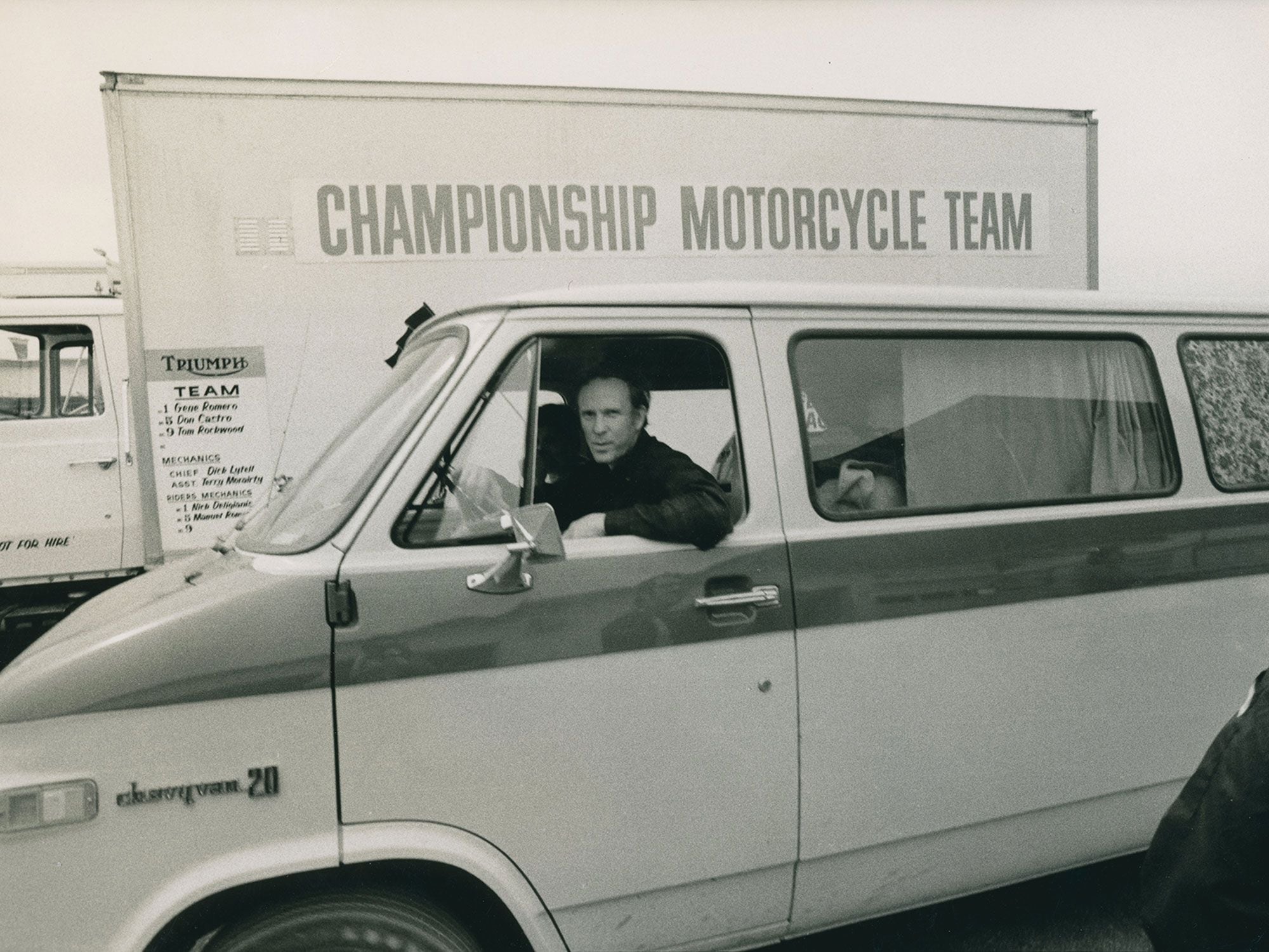 Mann in a van with a plan, in front of rival Triumph Championship Motorcycle Team truck, riders Gene Romero, Don Castro, and Tom Rockwood.