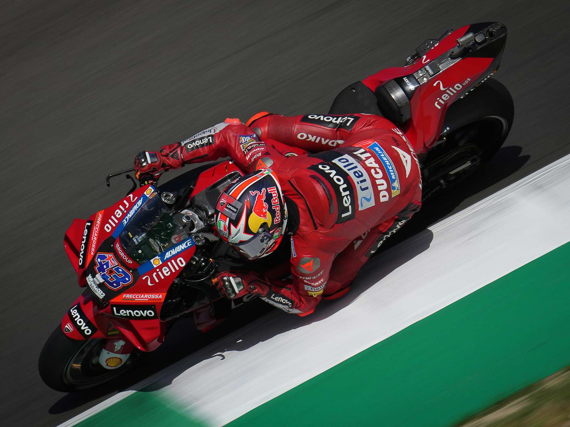 Look at the position on Jack Miller’s hands; he is turning left, but his left hand is slightly ahead of his right, demonstrating countersteering.