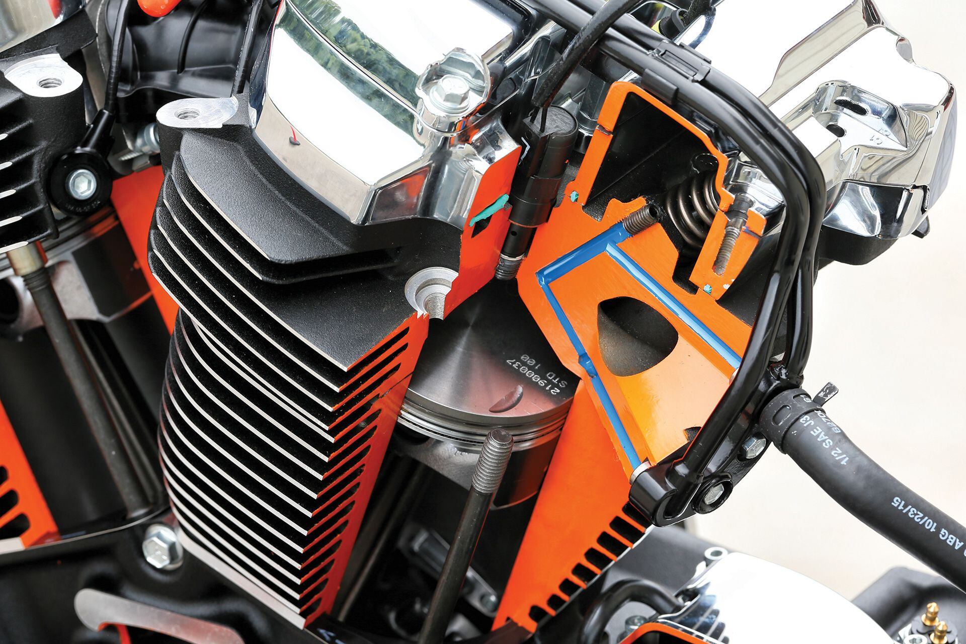 Liquid-cooling (in blue) around the exhaust valve seats and bridge in Harley-Davidson’s Milwaukee-Eight Big Twin engine.