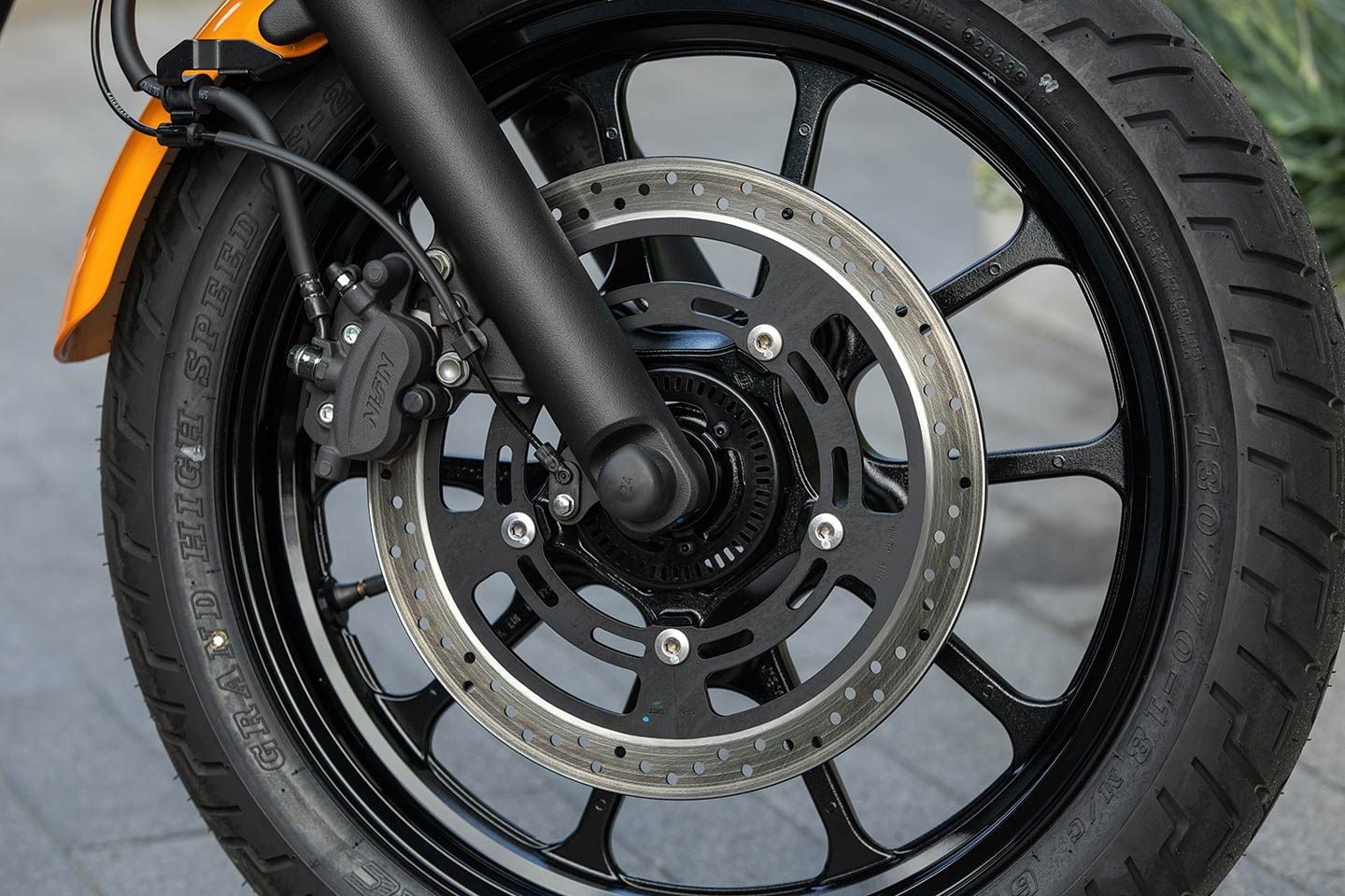 A single 310mm disc and dual-piston caliper handles braking on the front end. The 2024 Kawasaki Eliminator is available with or without ABS in Pearl Robotic White and Pearl Storm Gray.