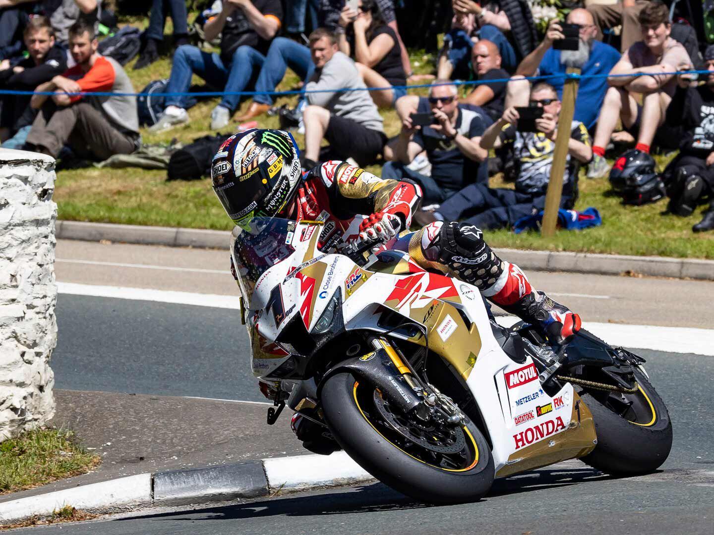 John McGuinness has his 100th TT start for Honda Racing UK on the 30th anniversary Fireblade CBRR-R, taking fifth on the opening day of racing and averaging 126.8 mph.