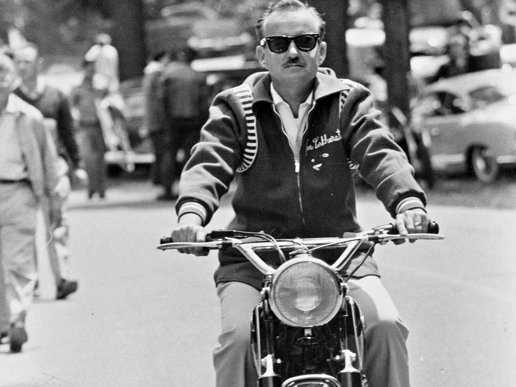 Always a man of style, Parkhurst cruises an Earles-fork BMW testbike in the 1960s.