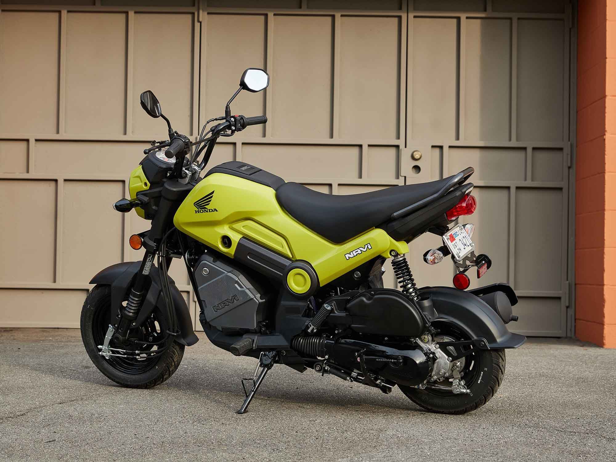 A 109cc OHC air-cooled single-cylinder engine sits at the rear, leaving room for a handy storage area in the middle of the frame.
