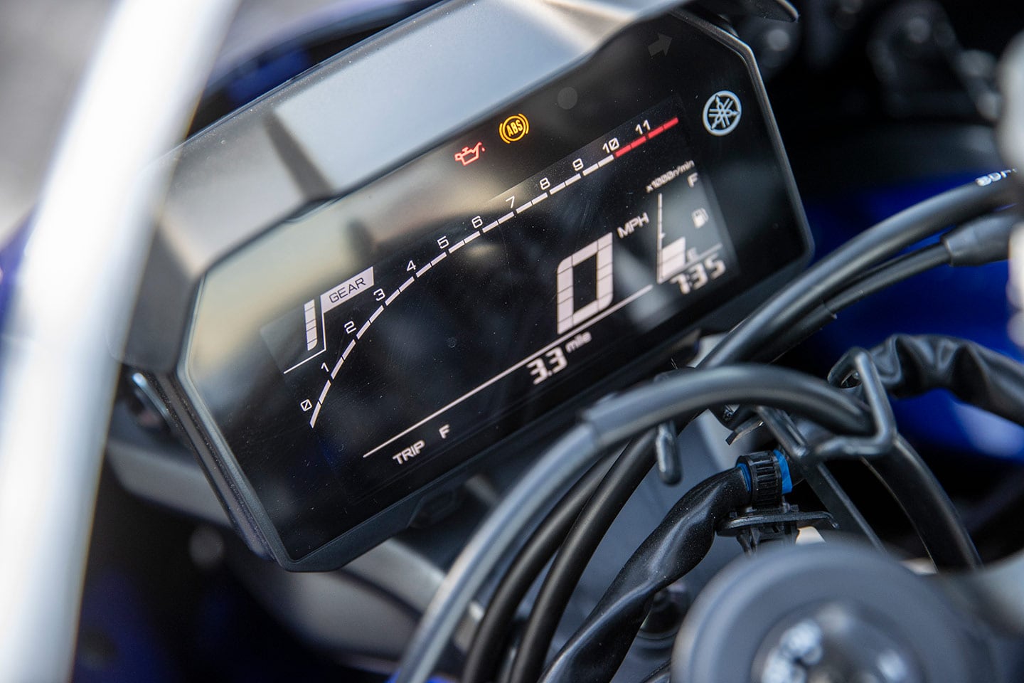Electronics aren’t the R7’s thing. There are no ride modes or electronic rider aids, meaning there’s not much to adjust through this LCD display. The display is tucked into the front fairing and covered by a few wires, meaning it can be hard to see at times.