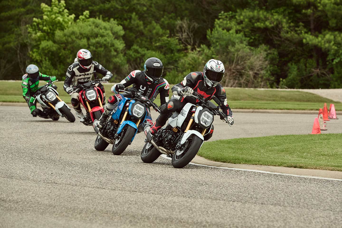 Sportbike Track Time hosted minimoto racing all weekend long on the Barber Proving Grounds track, and casual riders could sign up for open sessions. We snuck on early as part of a <i>three-hour</i> (!) endurance race Honda arranged aboard track-prepped 2025 Groms. The only thing more fun than hustling a minimoto around a small track: rubbing elbows with friends. Of the group we raced with, about three-quarters walked away already wanting to build their own track-prepped Grom. These things are addicting!
