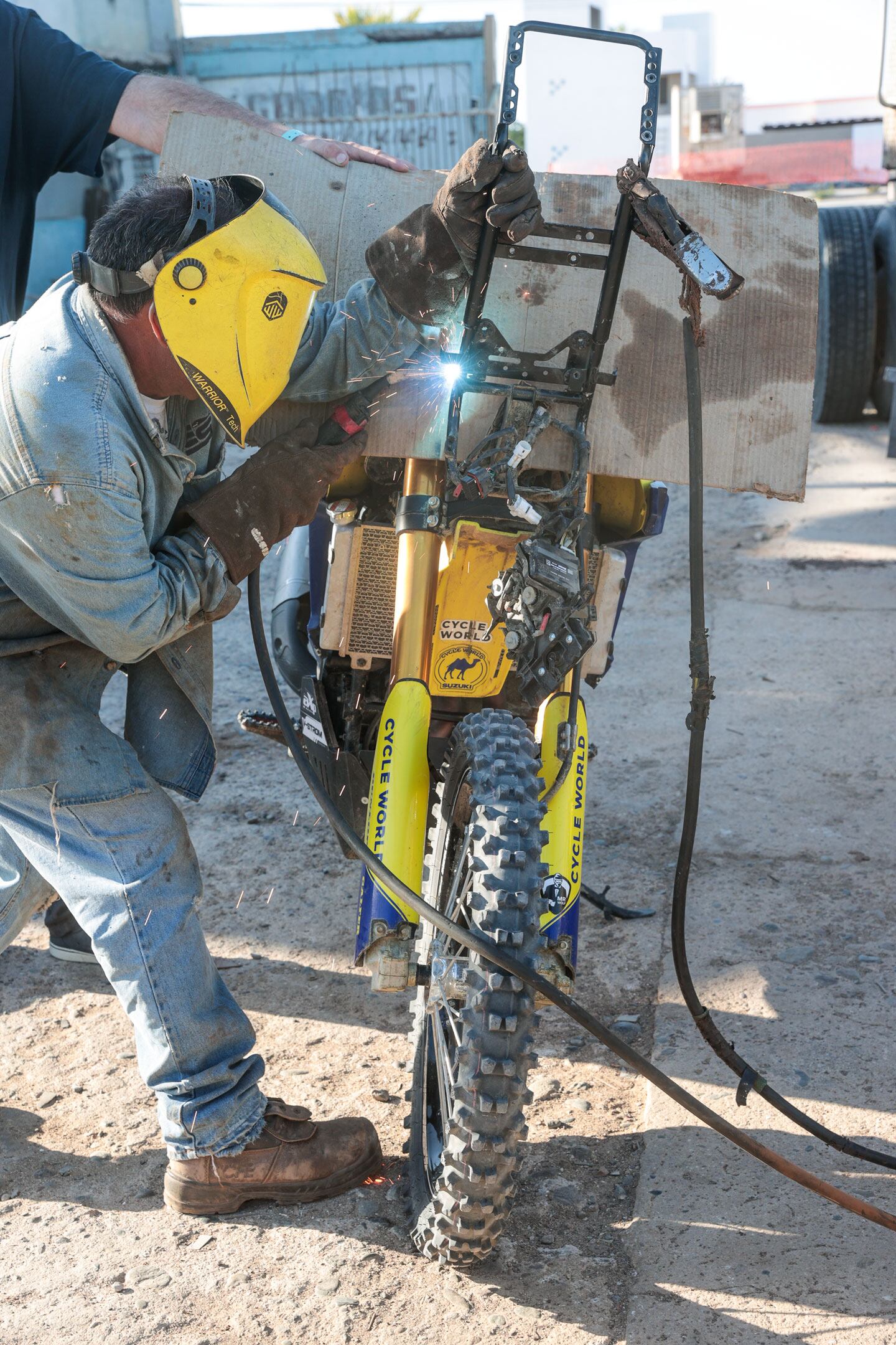Jose even has the right color welding helmet.