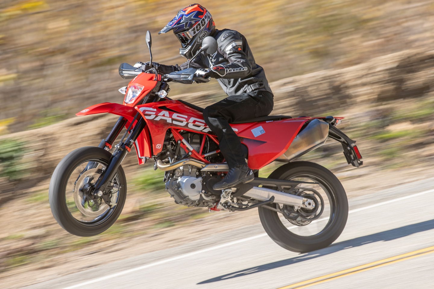 The GasGas SM 700 might just be the easiest motorcycle to wheelie. In second gear, the clutch is not required. Just snap it up!