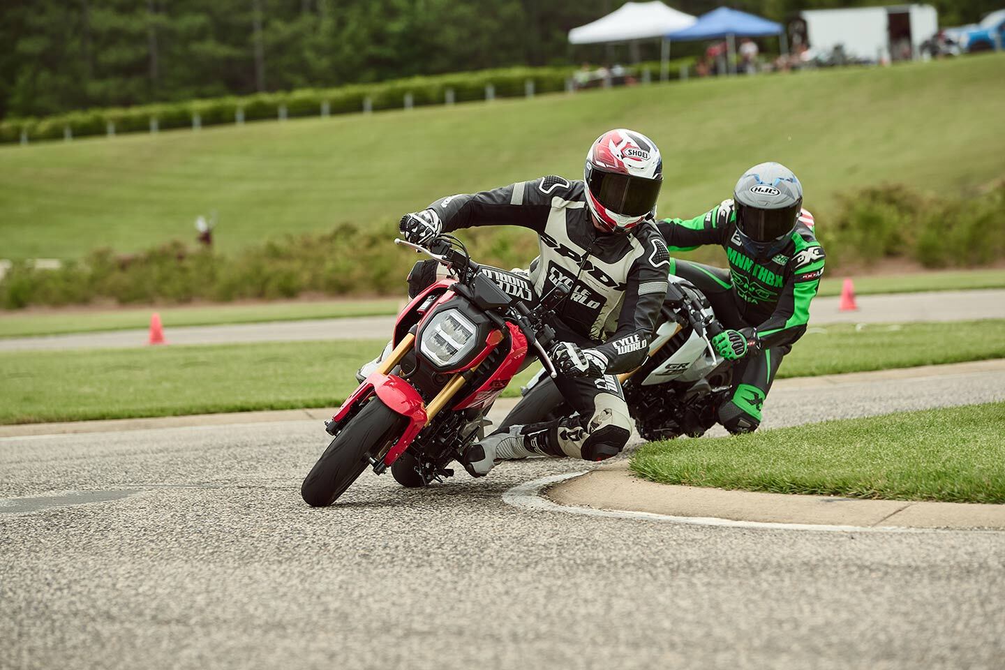 Beneath those helmets are a mix of smiles and red mist. It’s hard to not have fun riding a minimoto at the track with friends, but it’s also hard to not take it at least a little seriously.