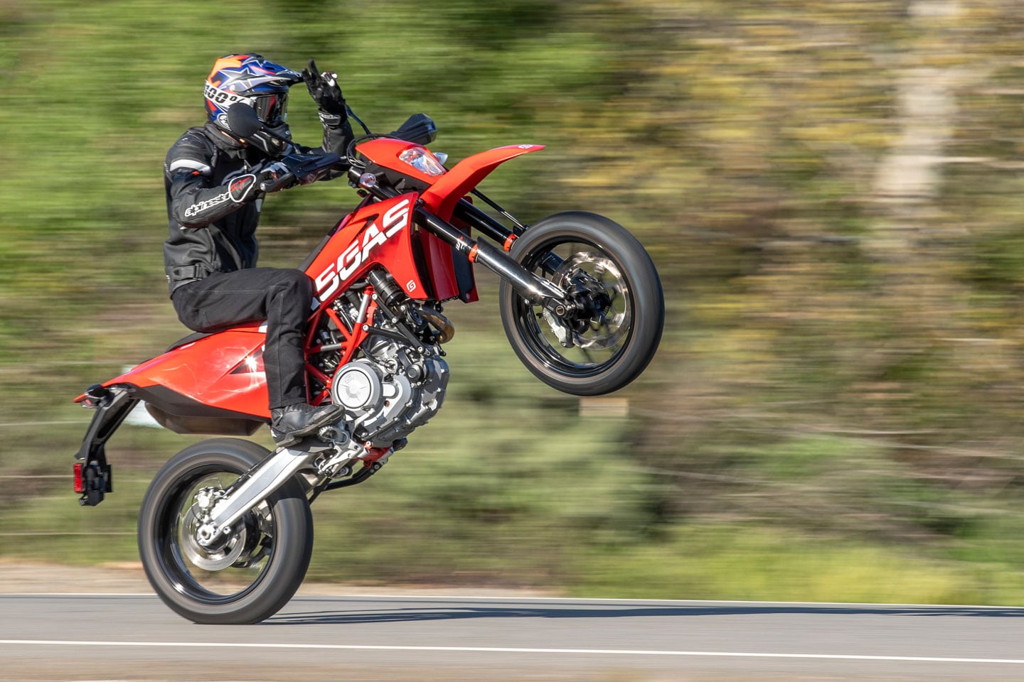 Seriously, how many more wheelies? Just two more.