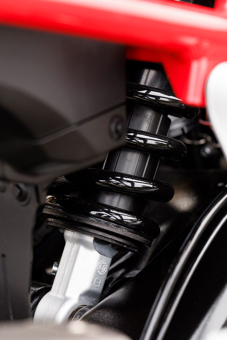 Some adjustment to the standard rear shock is necessary to get the most out of it on the road. Omission of a compression damping adjustment is one of the few misses on the base bike.