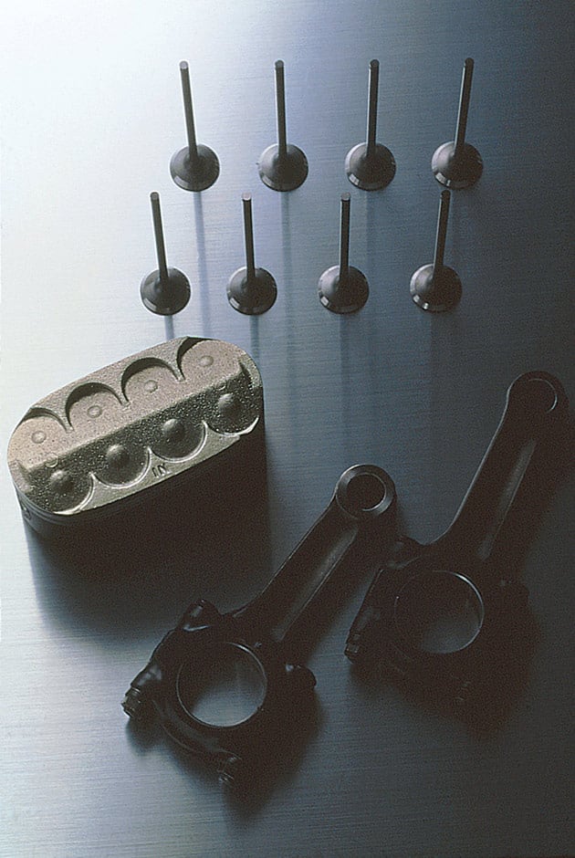 You can see the curved piston face on the production NR750’s pistons instead of the flat front originally found on the early NR500 test units.
