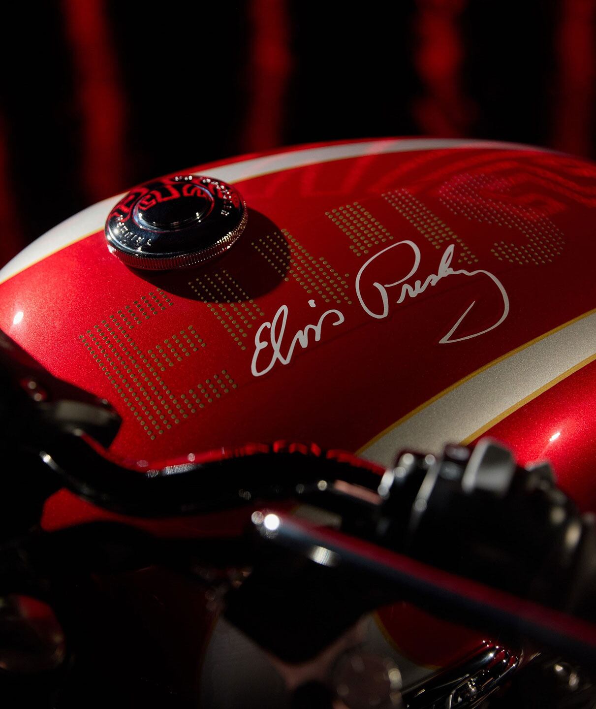 The King’s signature (or a facsimile thereof) appears on the tank and side panels.