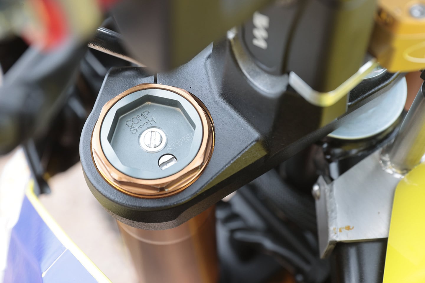 With some machining and a spare RM-Z250 laying around you too can have a KYB motocross fork on your V-Strom.