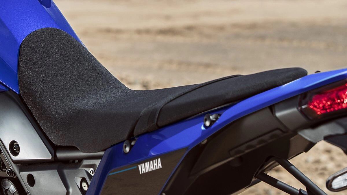 The stock Ténéré 700 seat dips low for a manageable seat height. Yamaha’s optional one-piece rally seat ($219.99) sits 1.6 inches taller for added comfort, for taller riders.