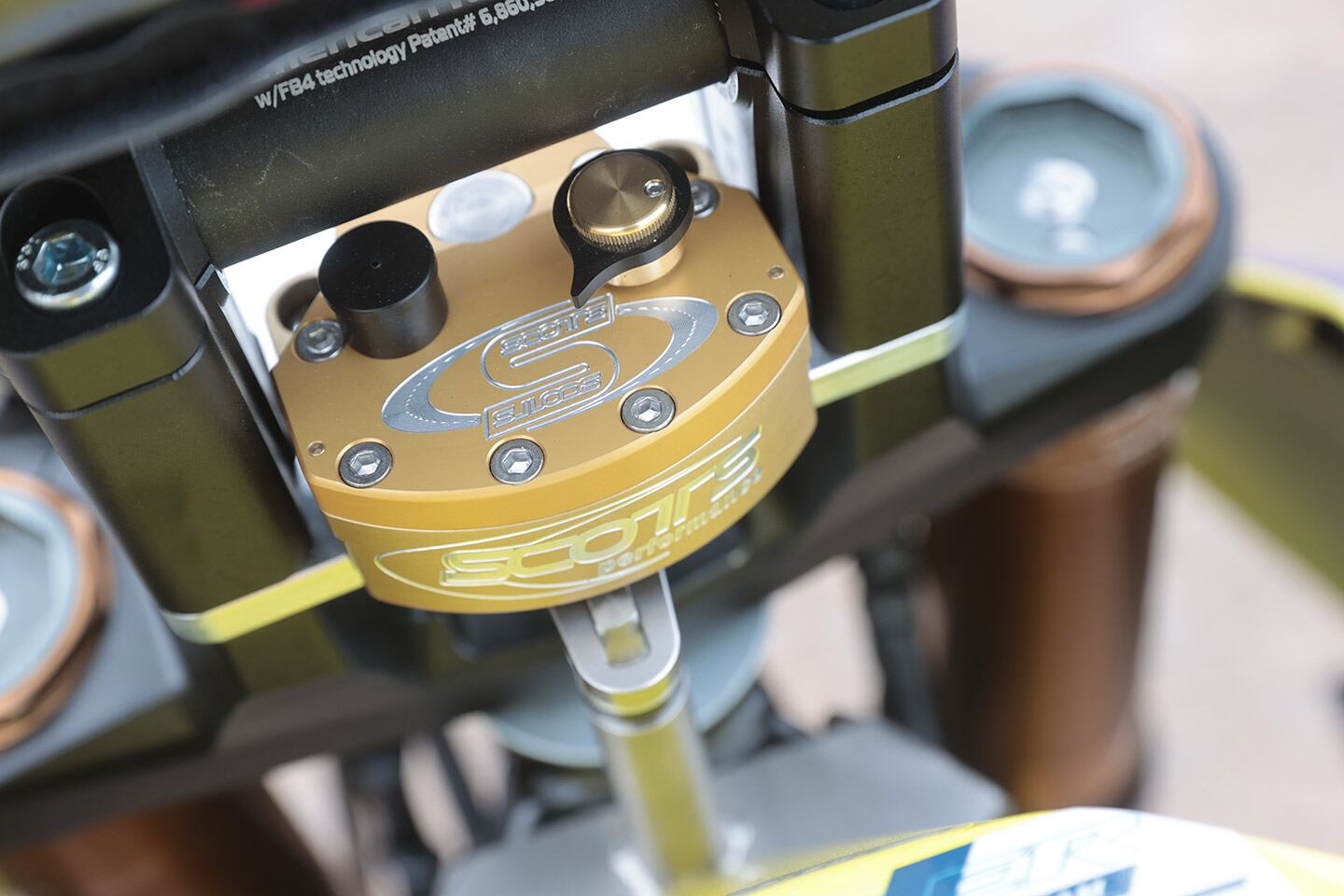 Without the help of Stefan at Hessler Rallye Team, we would not have had a way to mount a steering damper on our DR Big racer.