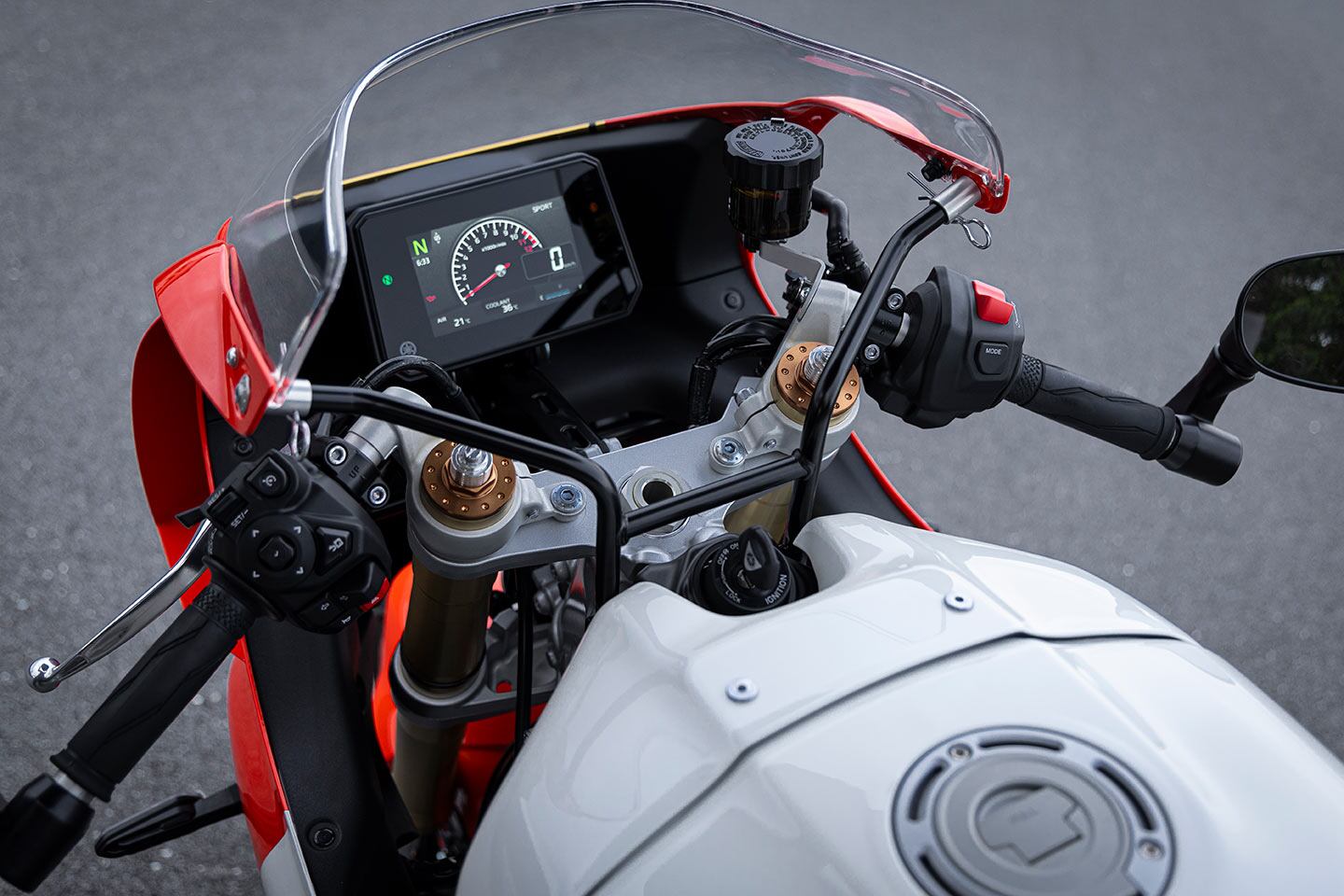 Just past the retro fairing stay is a full modern TFT dash.